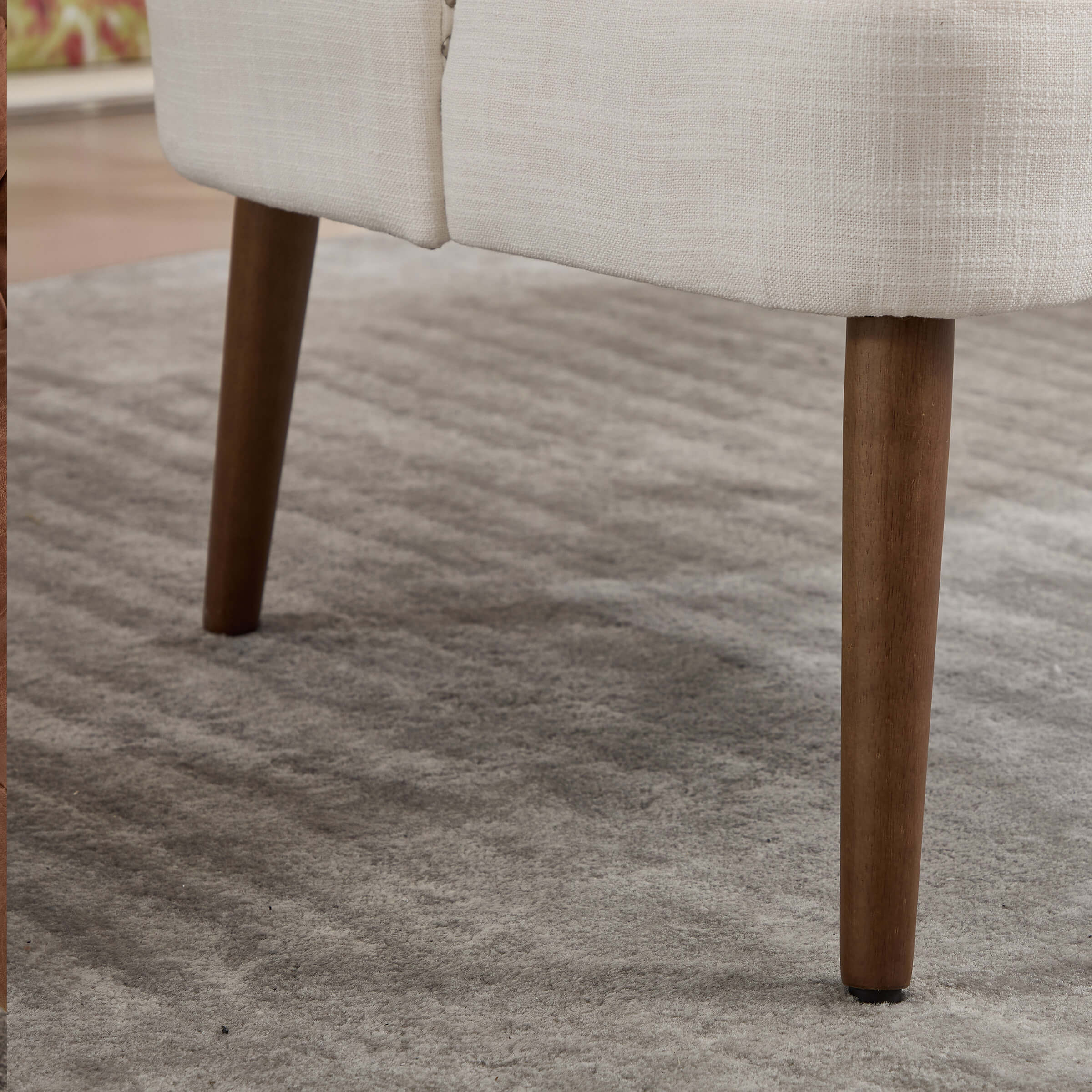 Legs of the chair on rug