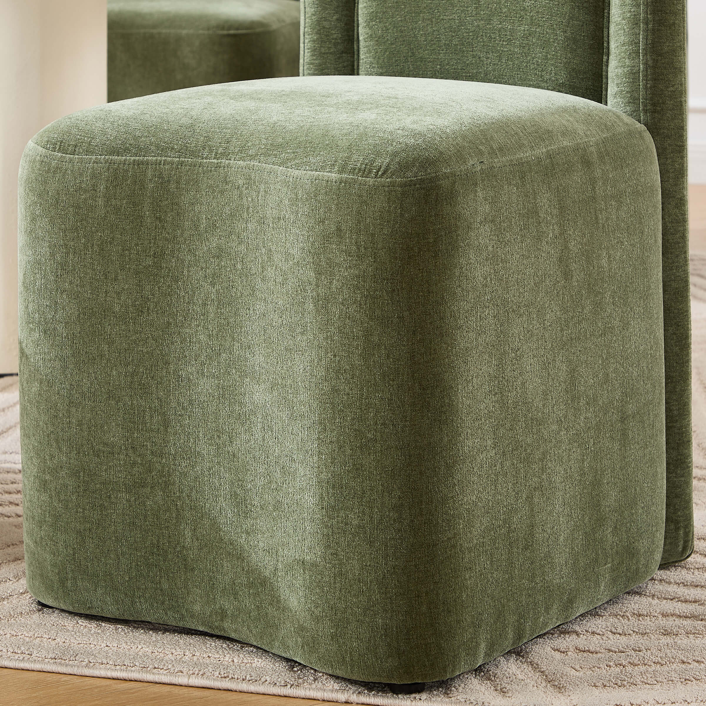 Green upholstered cube ottoman/seat