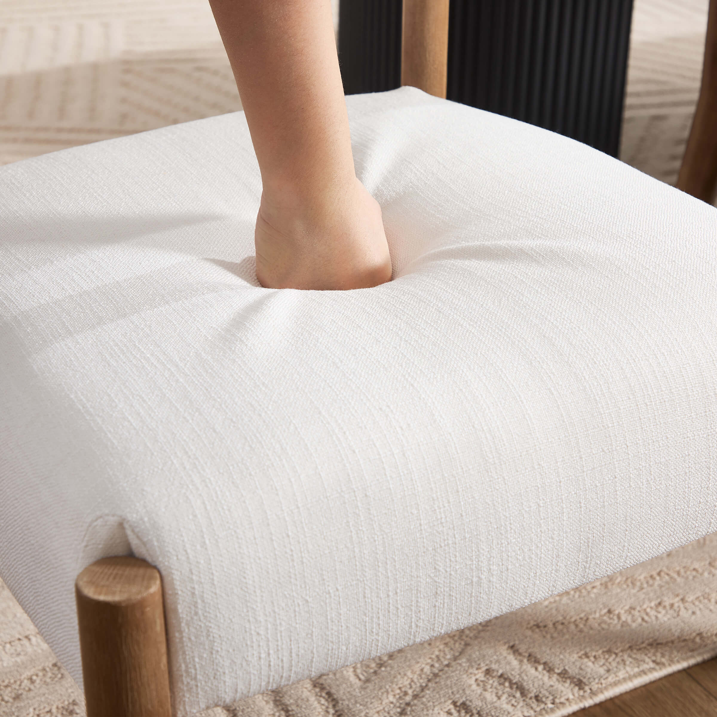 Close-up of white chair edge and fabric texture