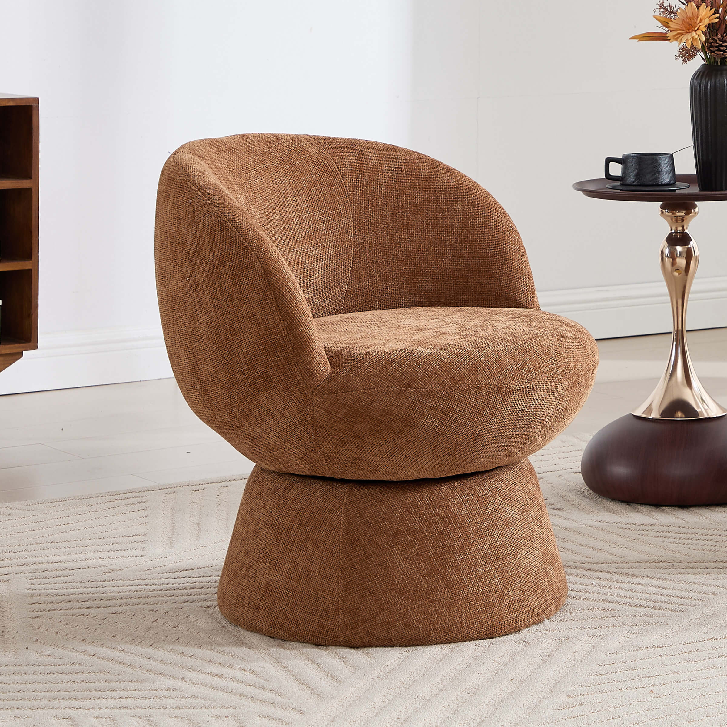 brown swivel barrel accent chair in a room
