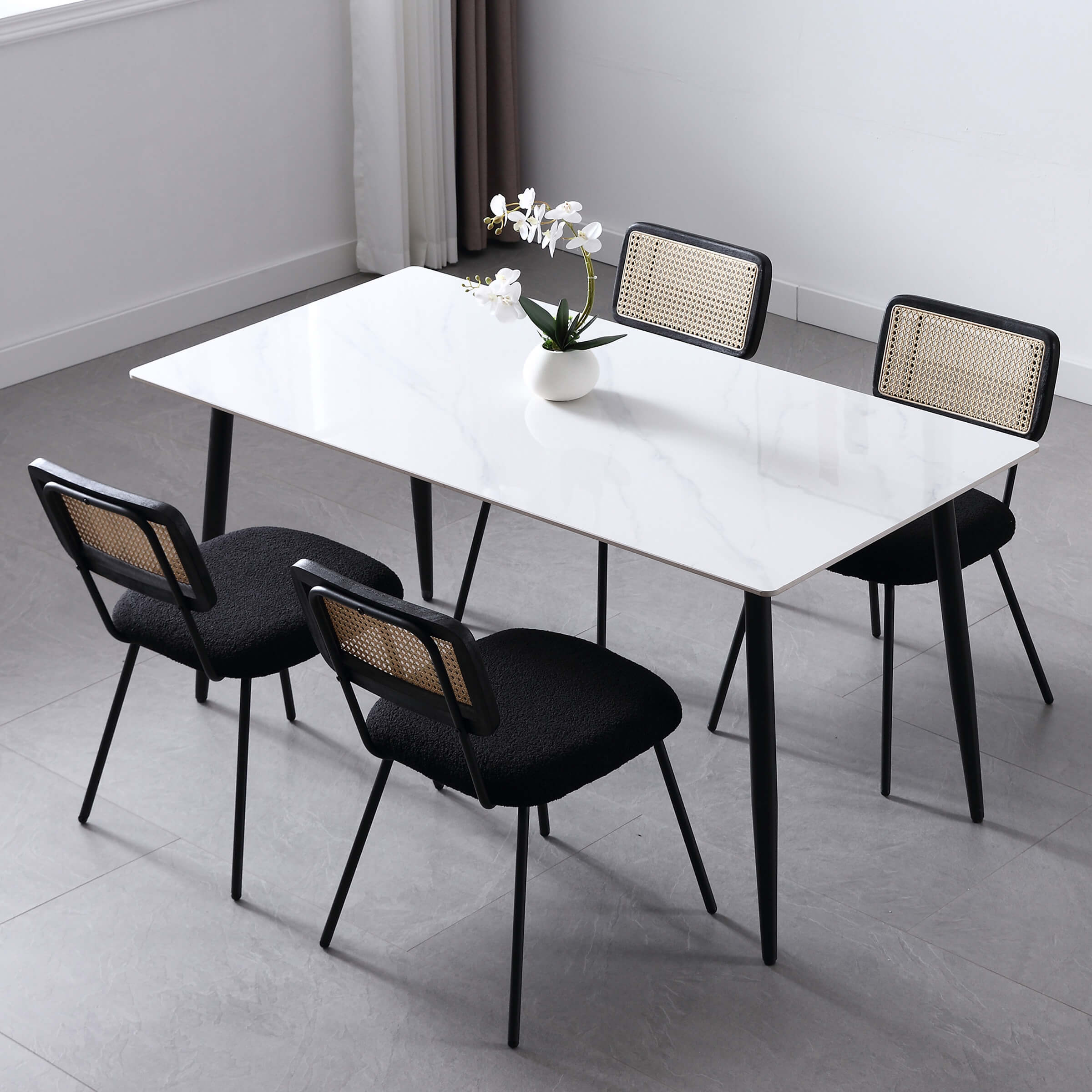 Dining table and four chairs from above, top-down view