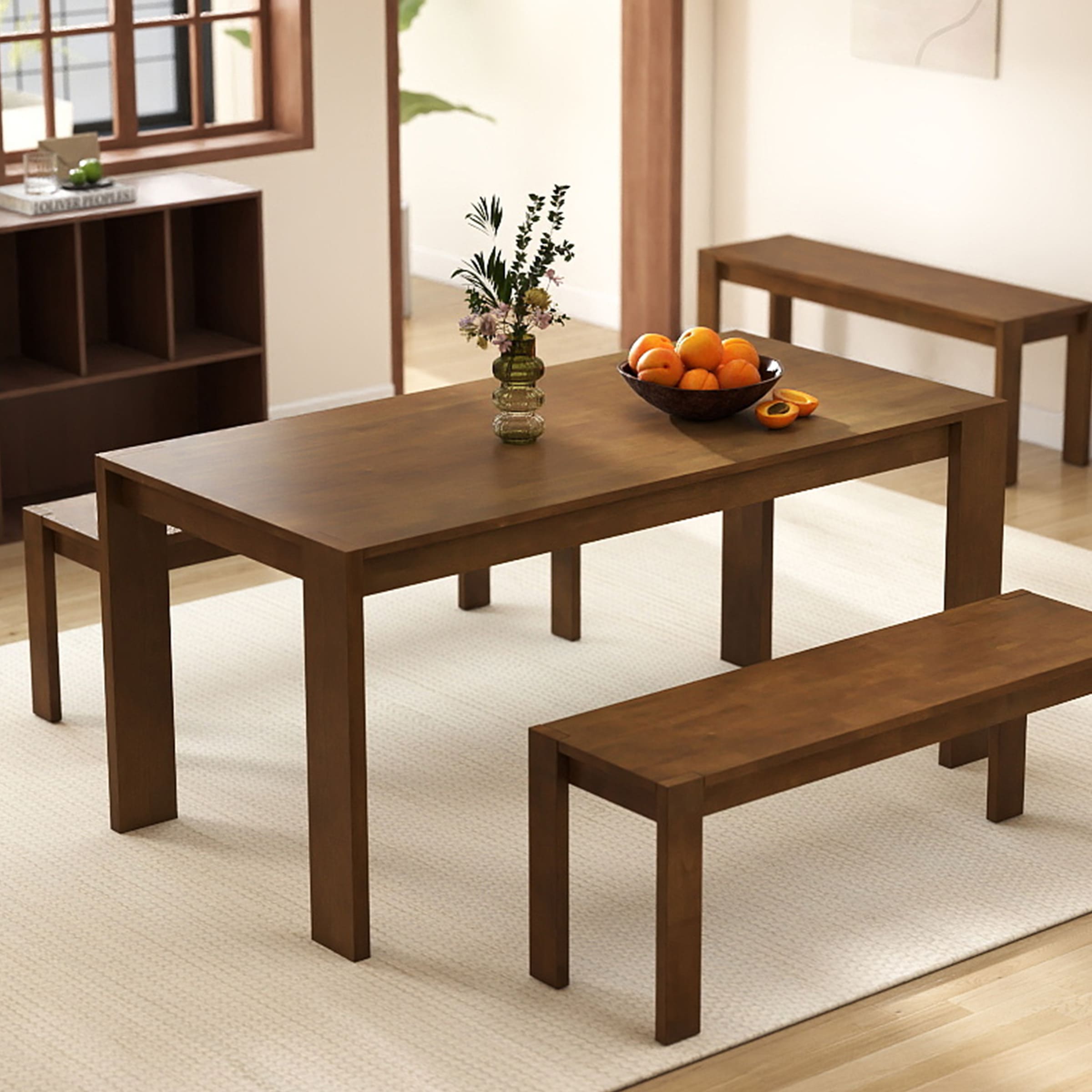 Set of dining table with benches in living area