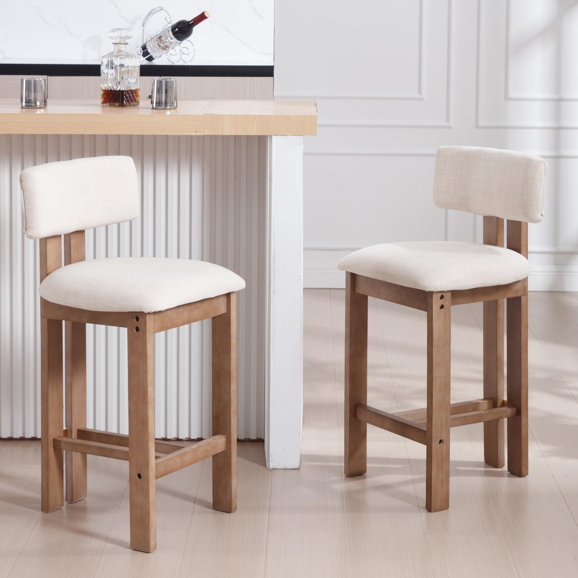 Two stools at bar in daylight