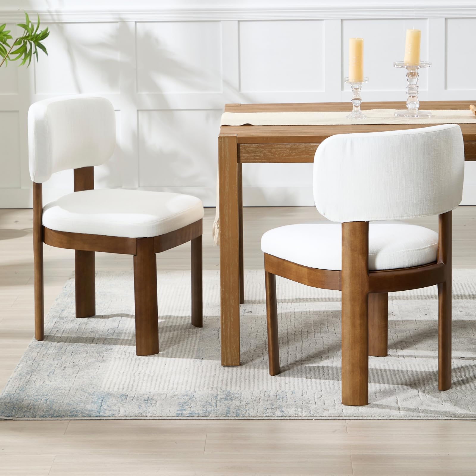 Two white chairs with table