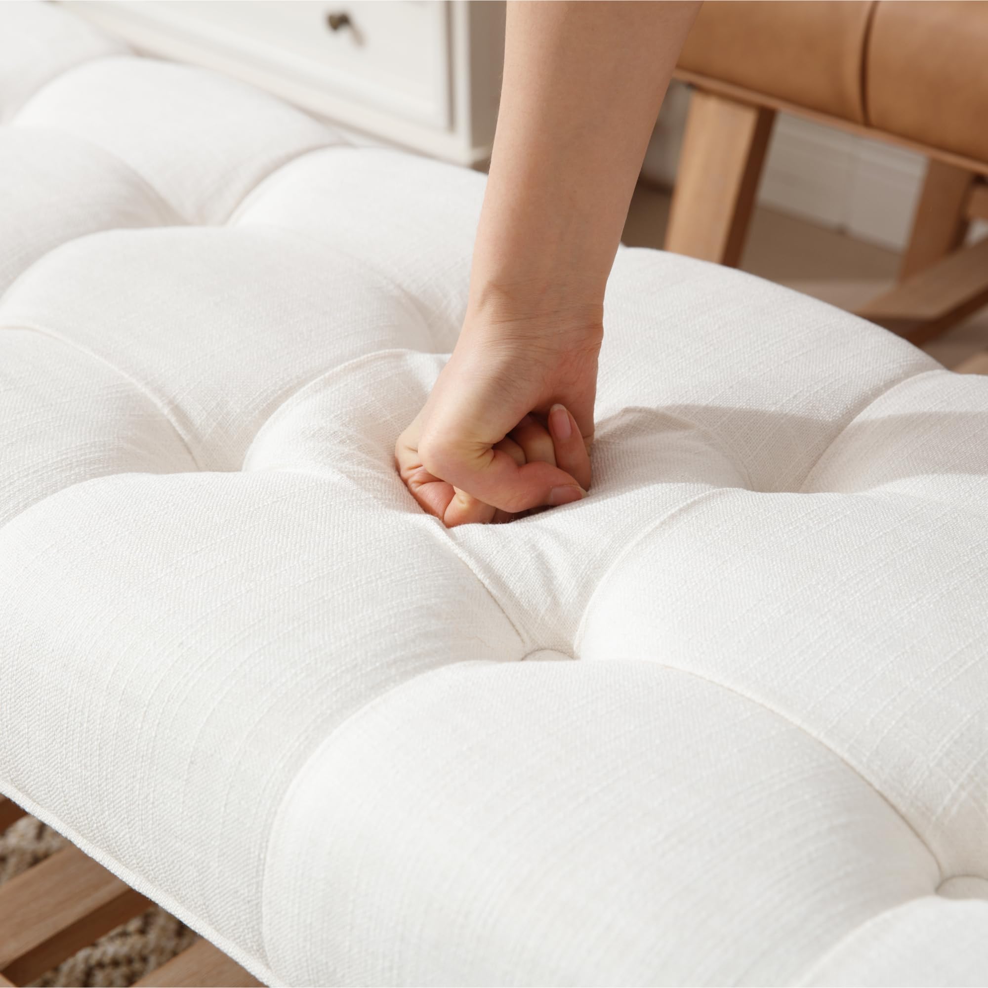 Close-up of tufted cushion