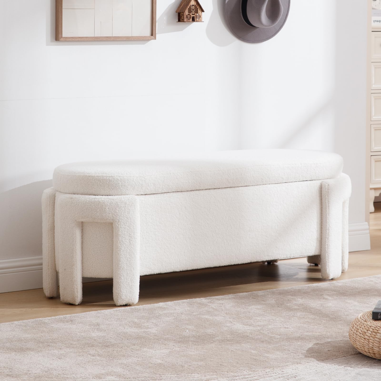 White velvet storage bench in a bright room