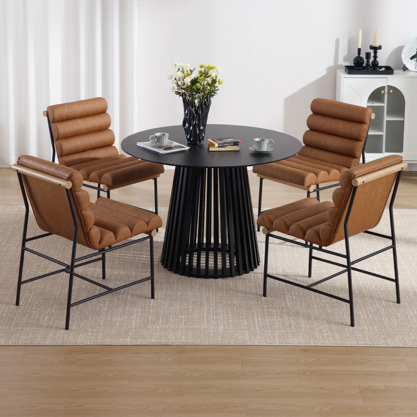 Round table with two chairs in dining room