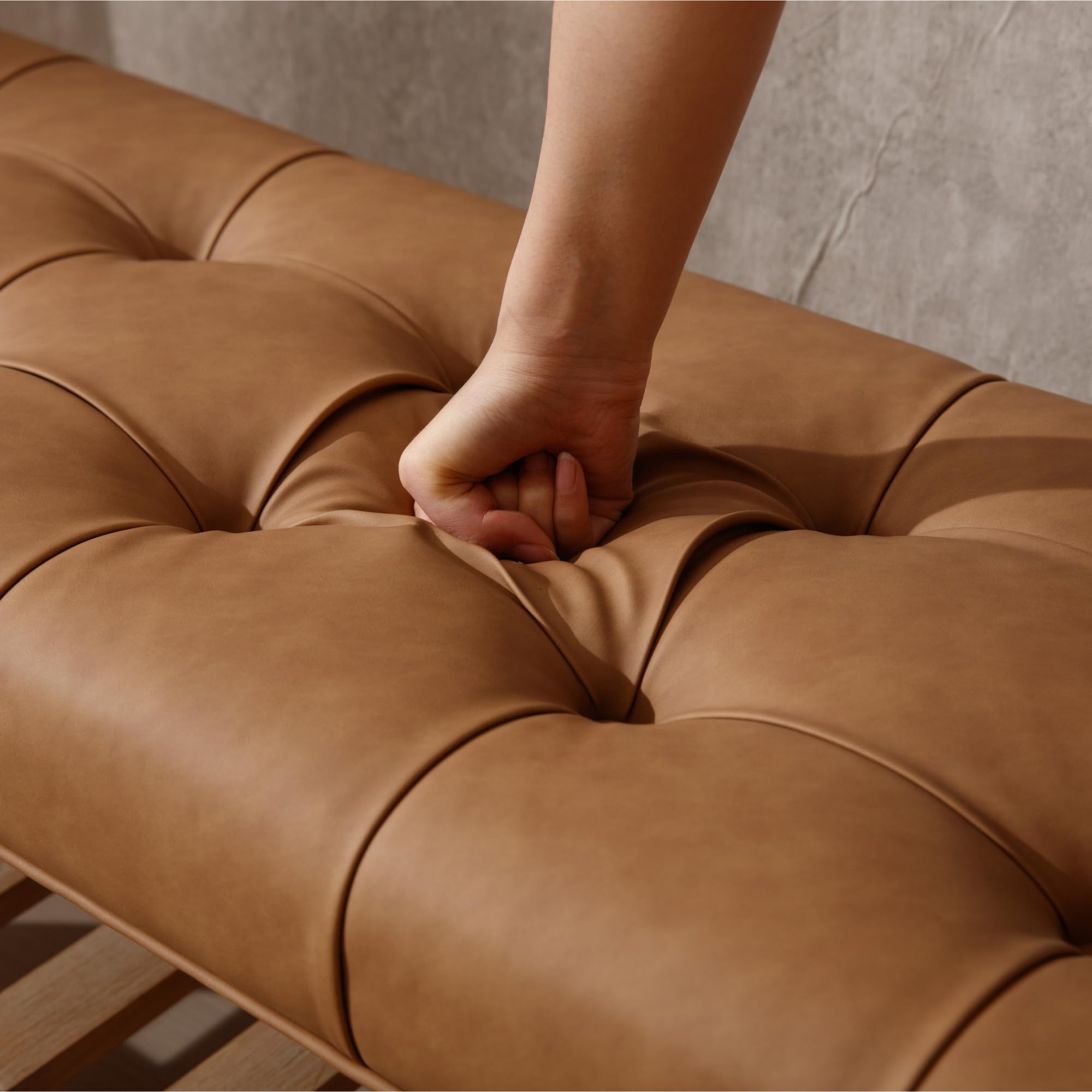 Leather cushion tufting close-up
