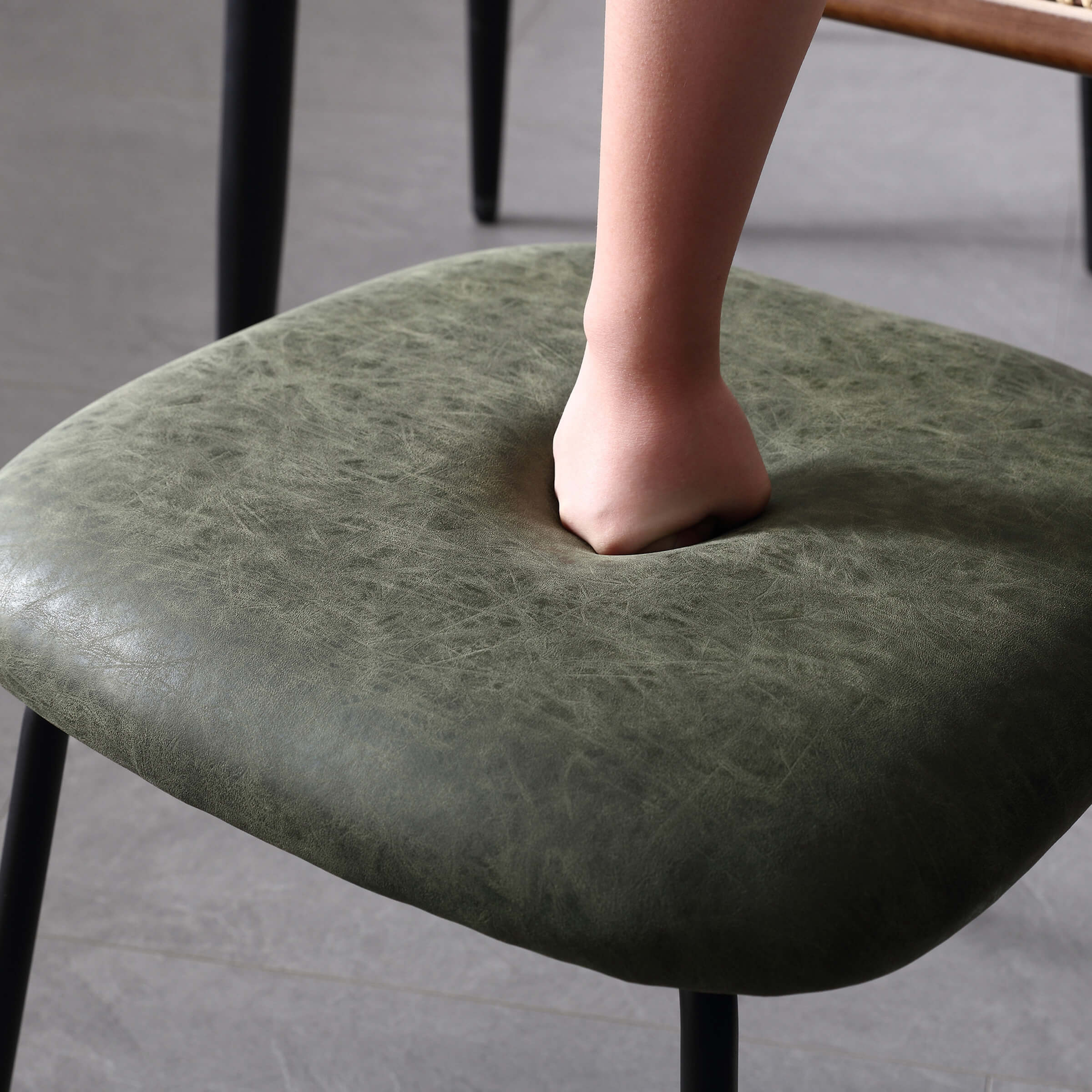 Close-up of green cushion surface