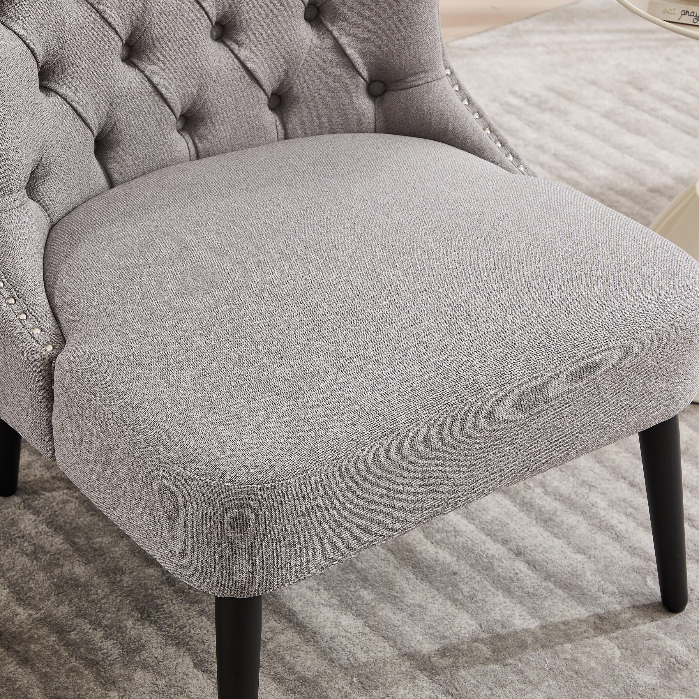 Close-up of chair seat cushion and upholstery