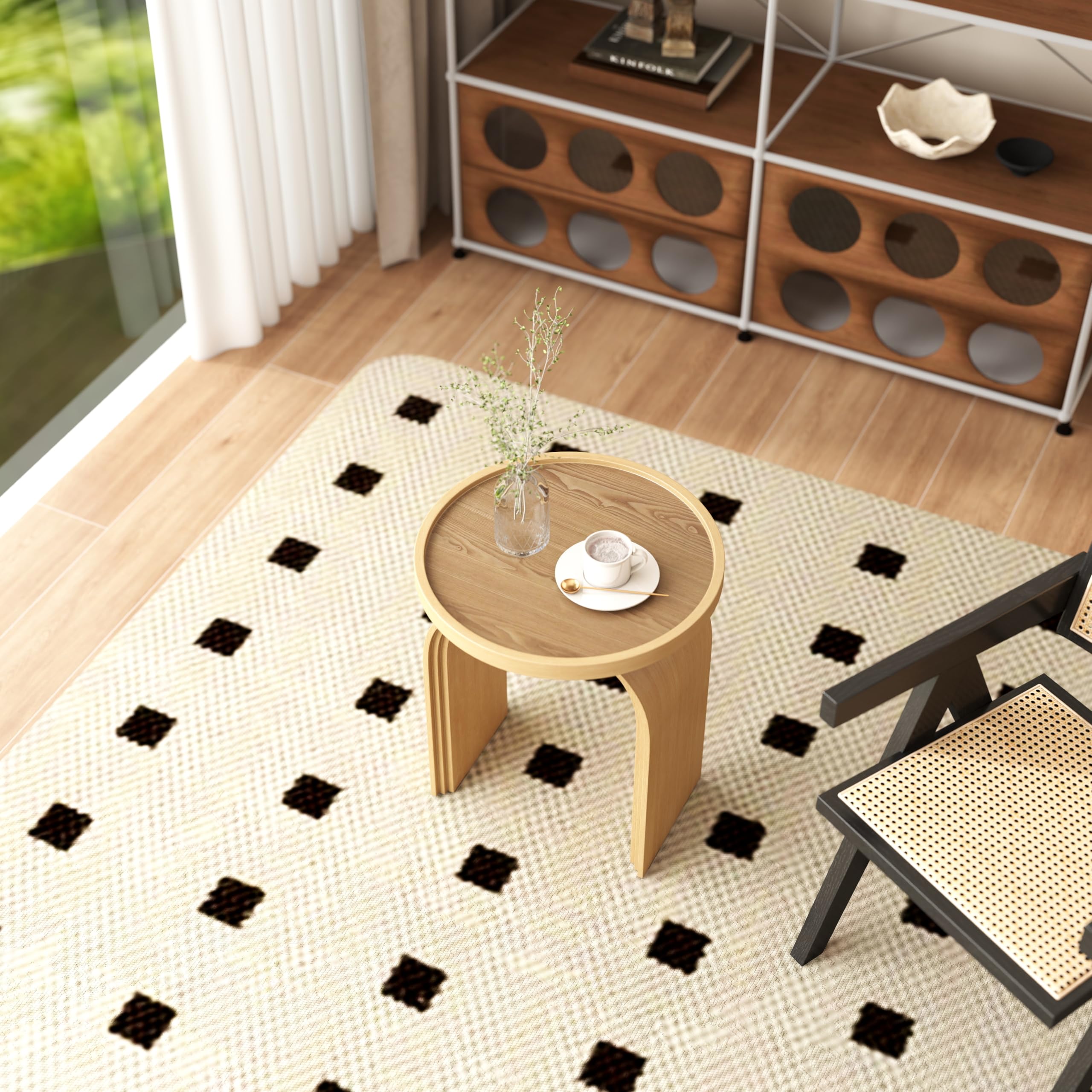 Round wooden side table with decorative vase on top