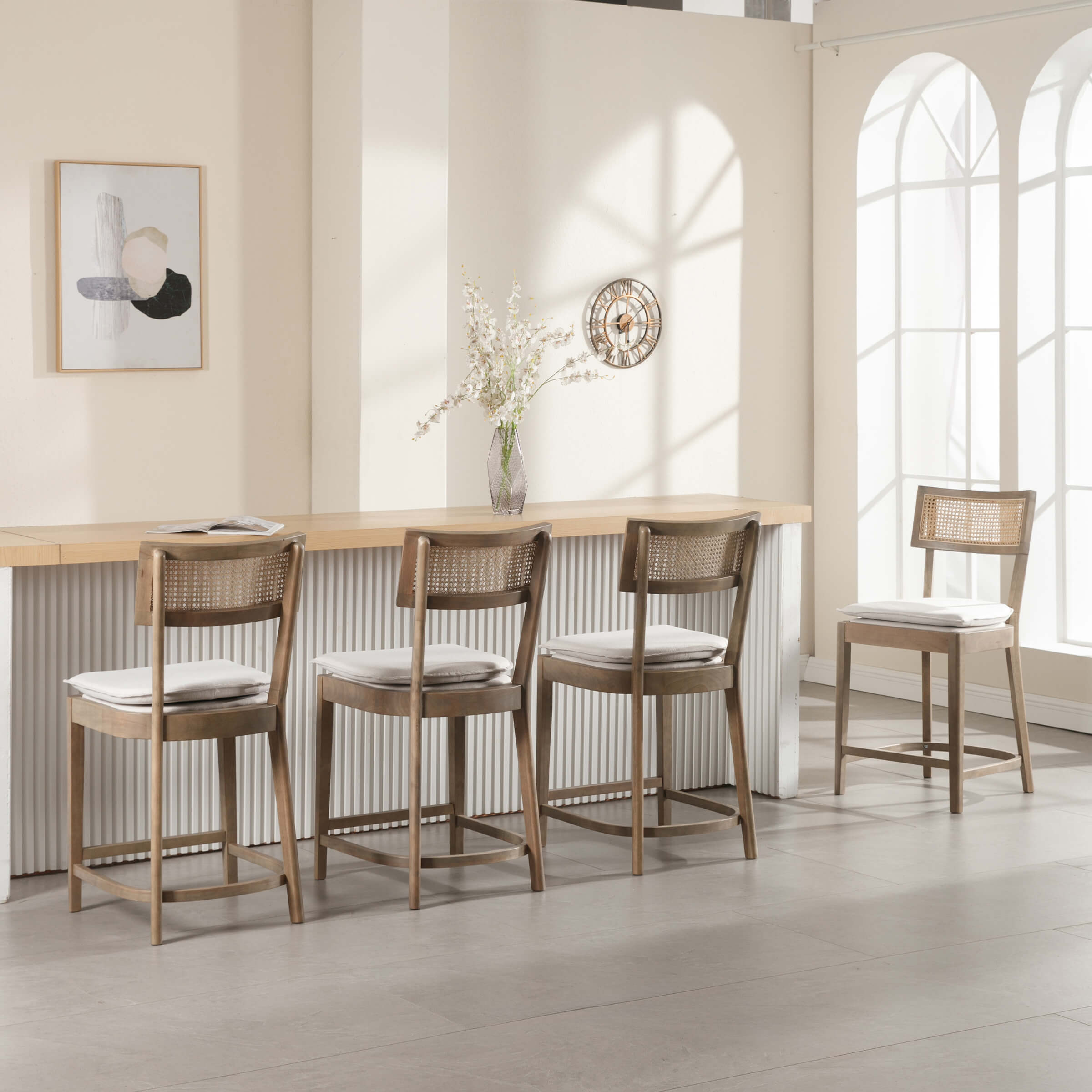 Group of five stools lined up by bar