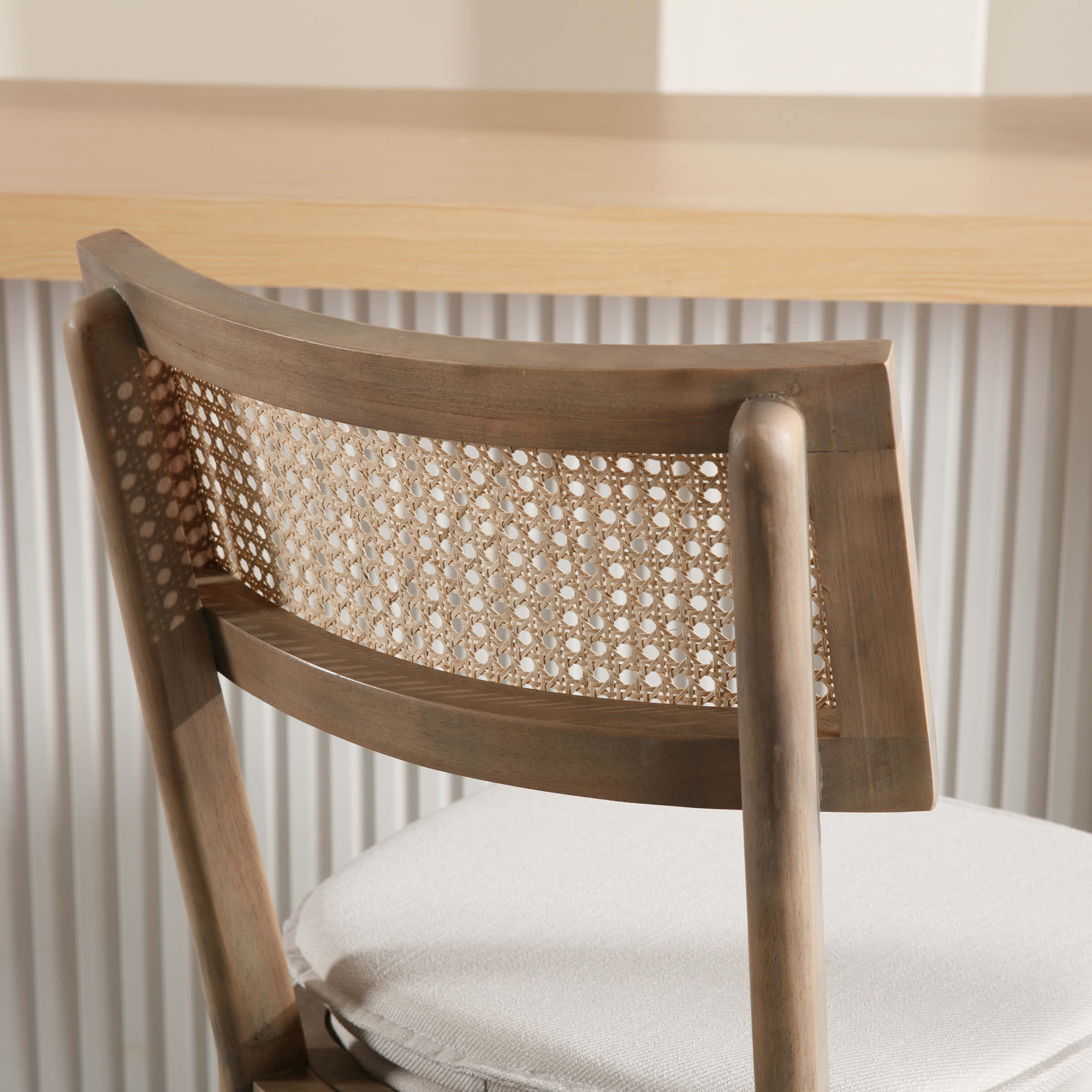 Cane back close-up with wood frame