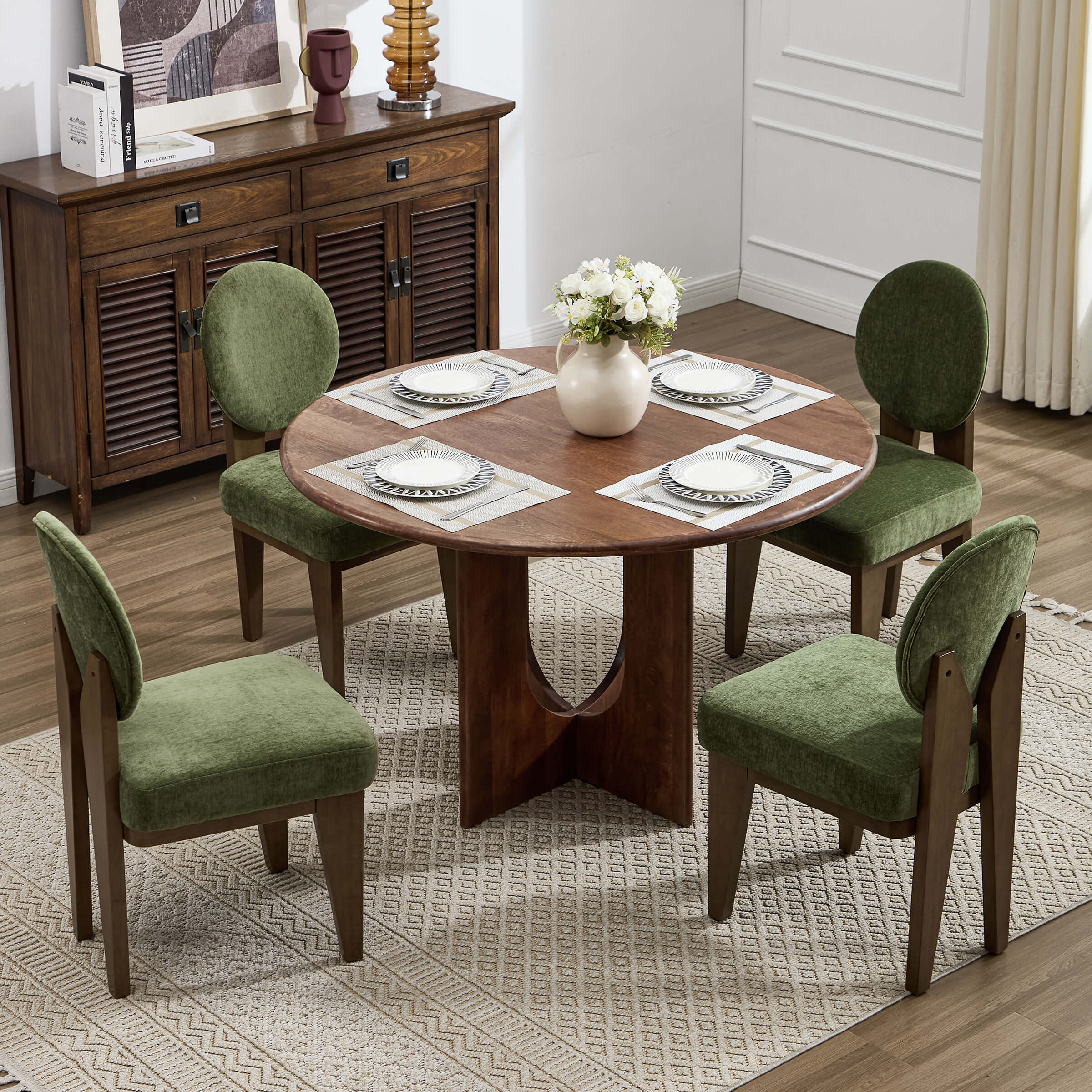 Green chairs around a dining table
