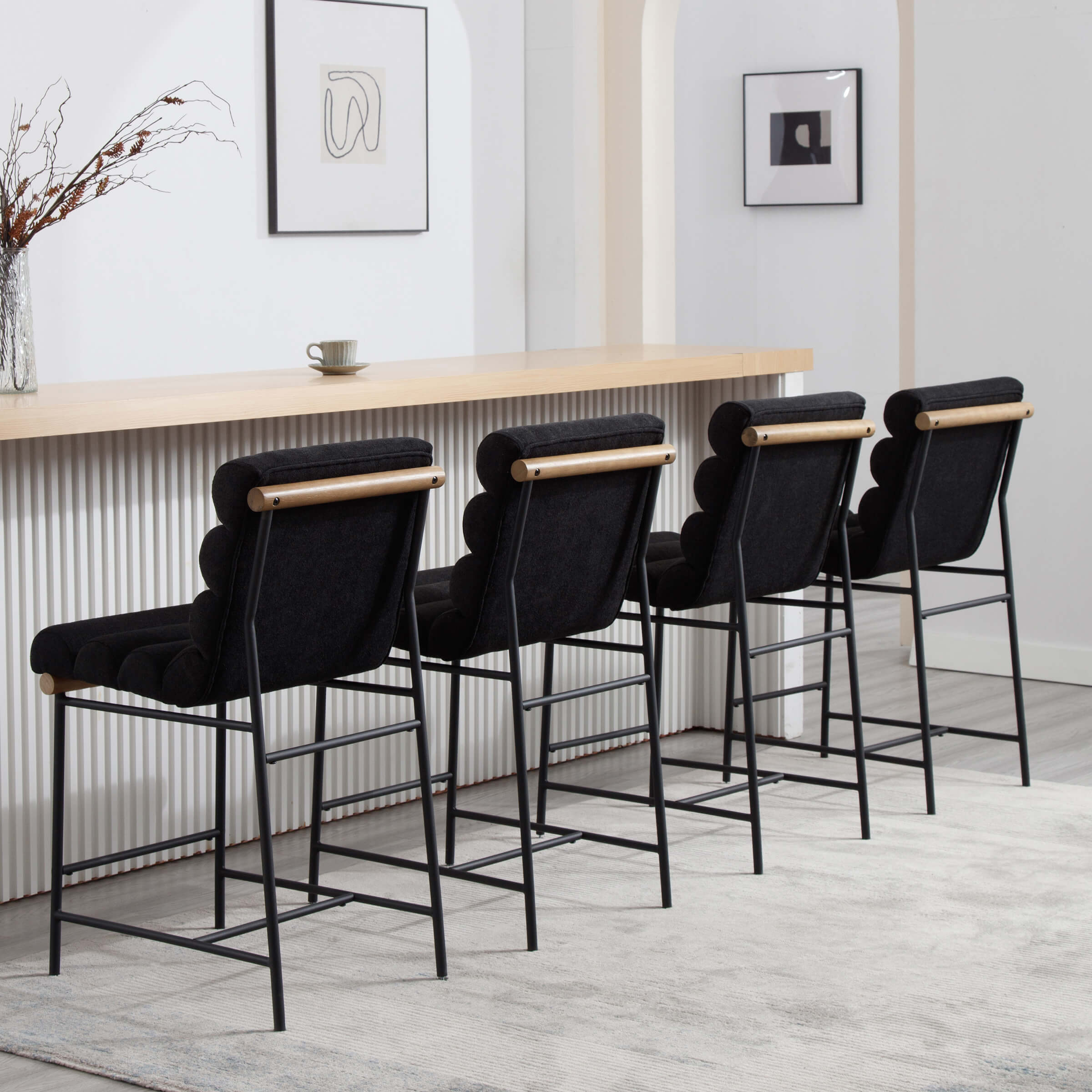 Row of stools along a bar with a single black version