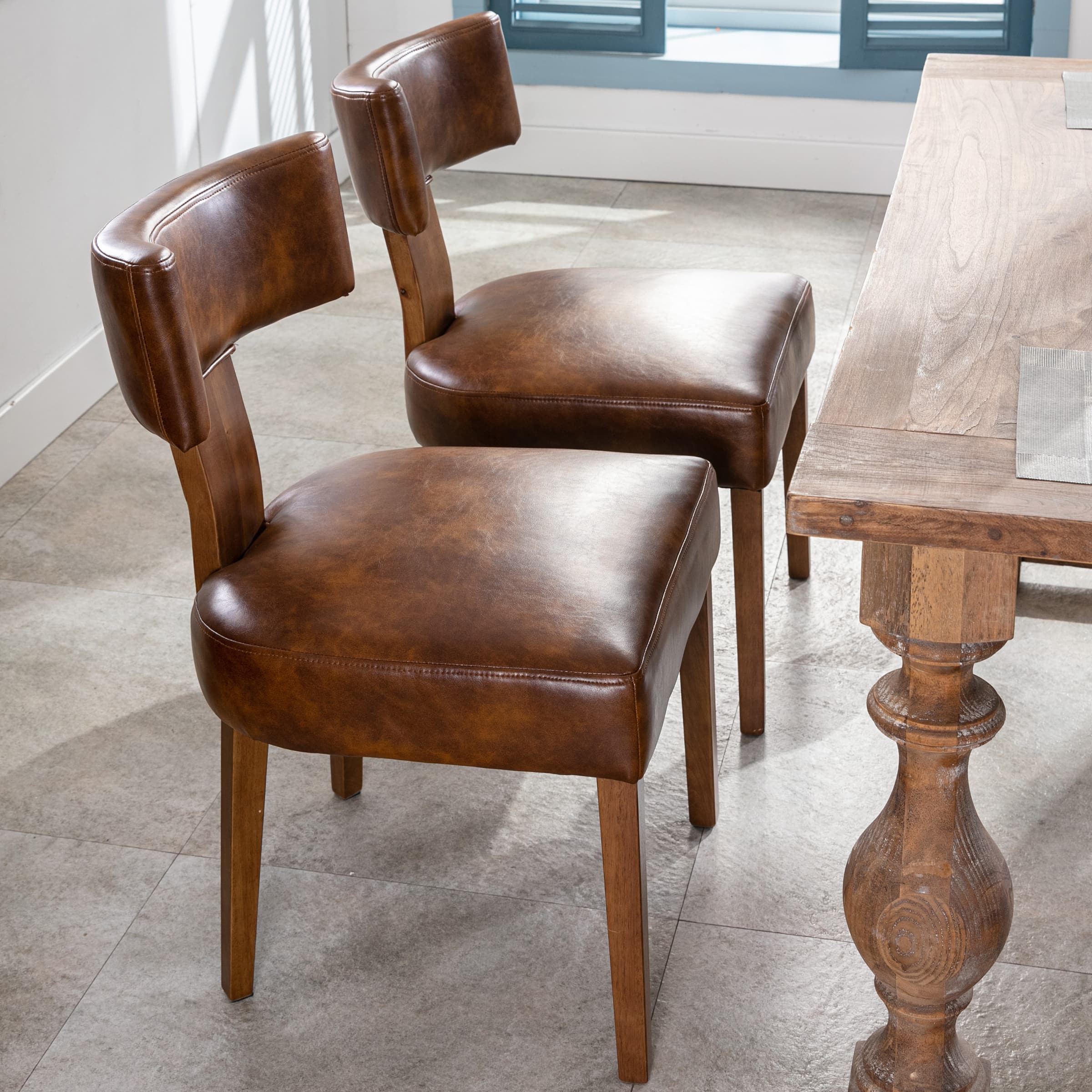 Four chairs around dining table