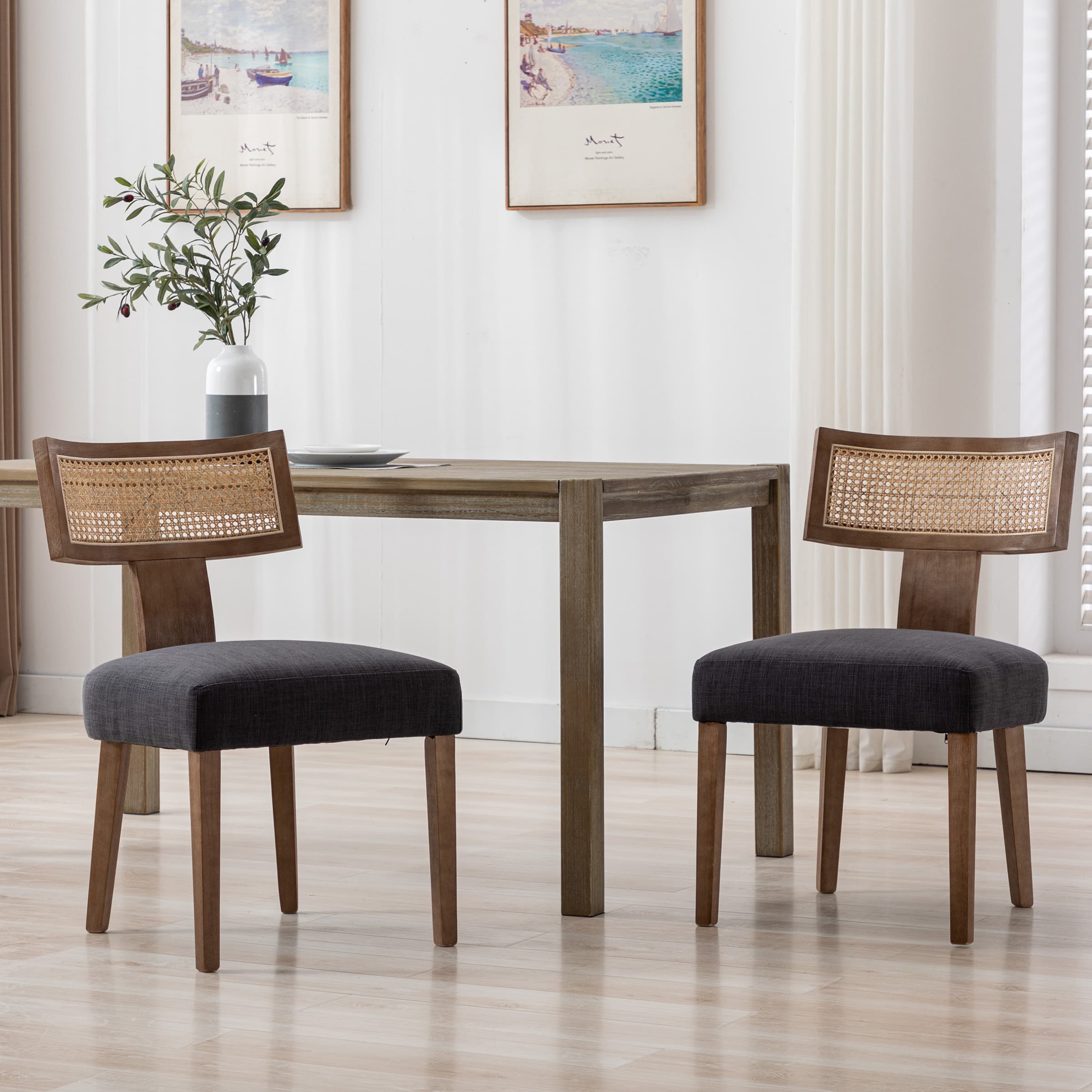 Chairs around table with plant decor
