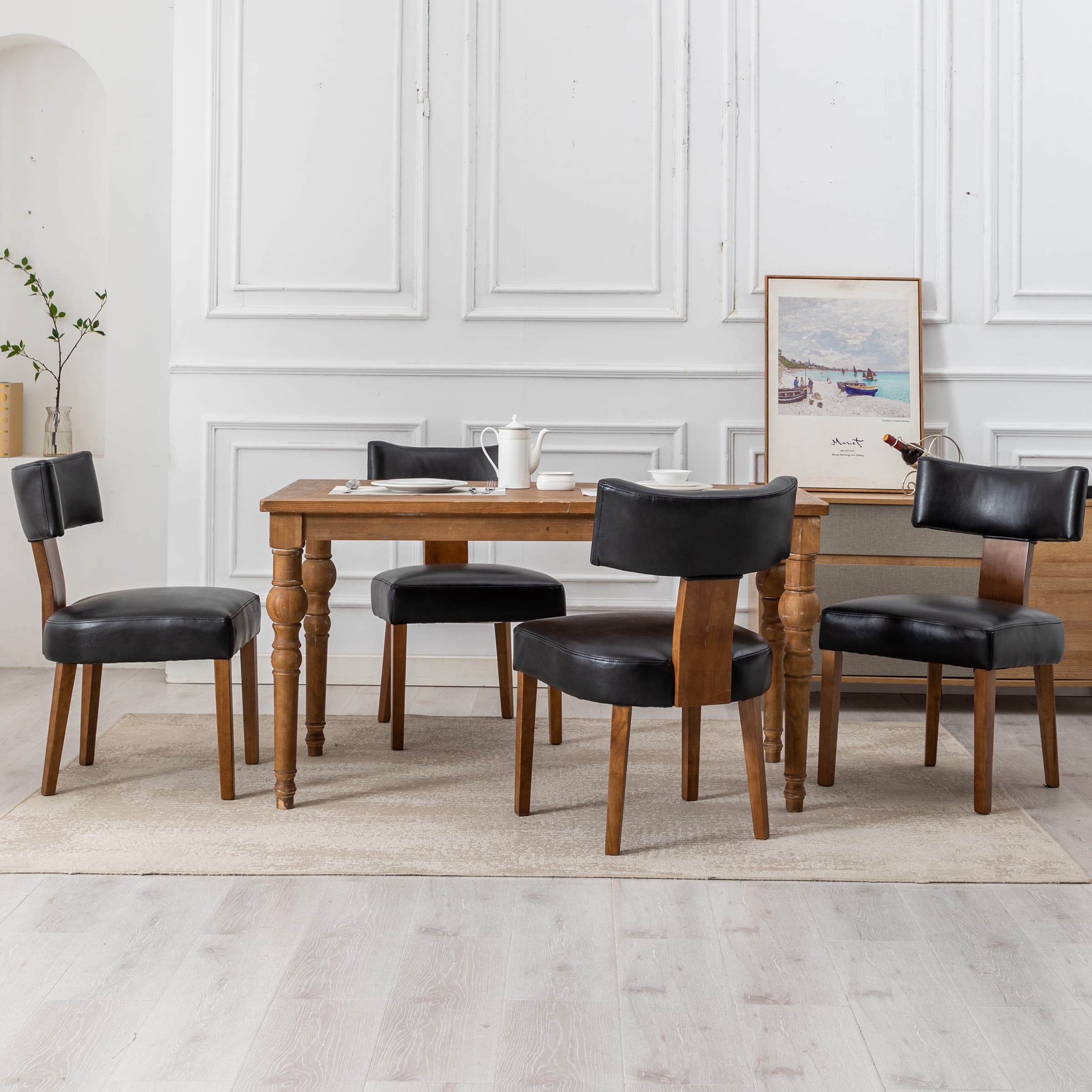 Chairs with caned backs and leather seats