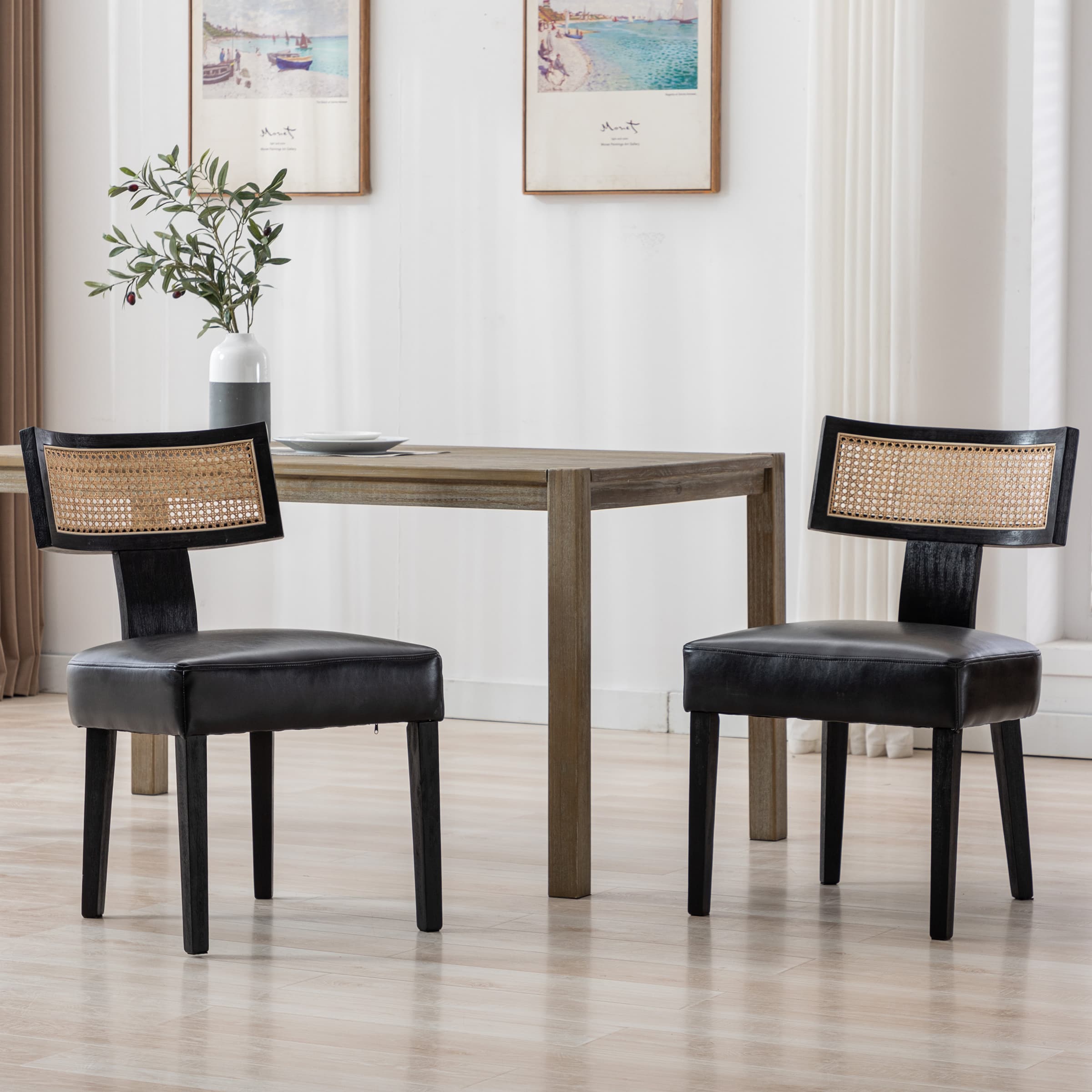Set of four chairs around table
