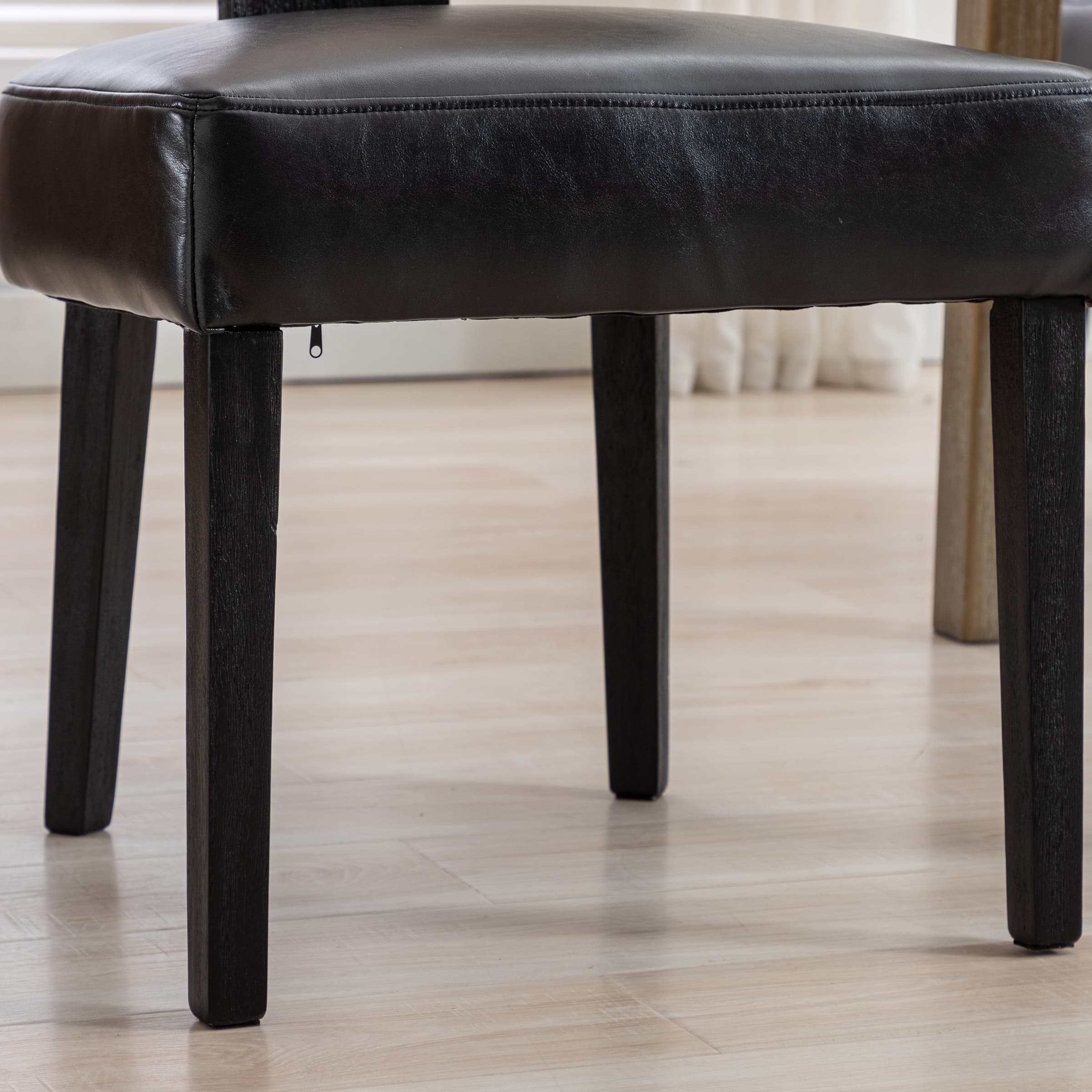 Close-up of seat and leg