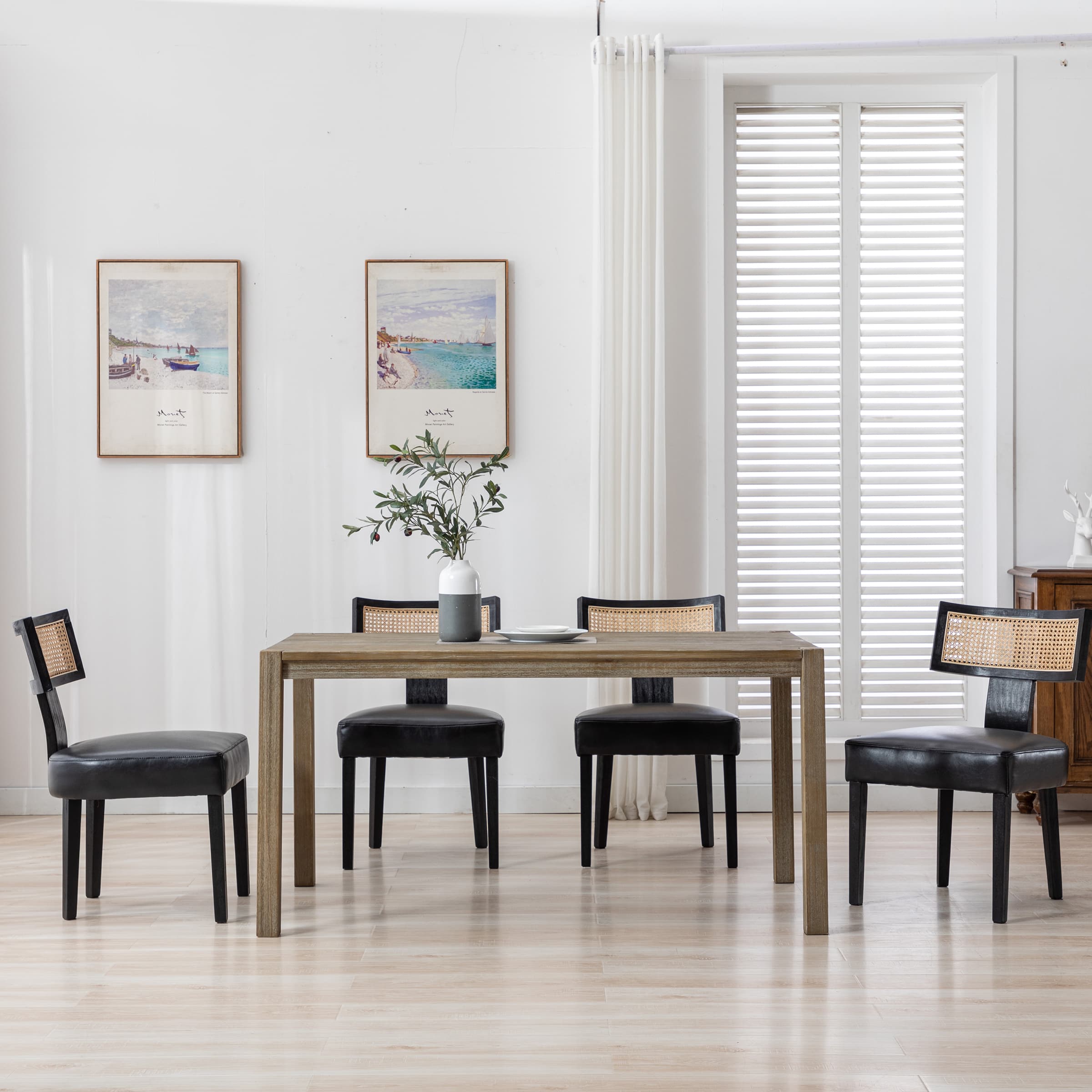 Set of four chairs around table