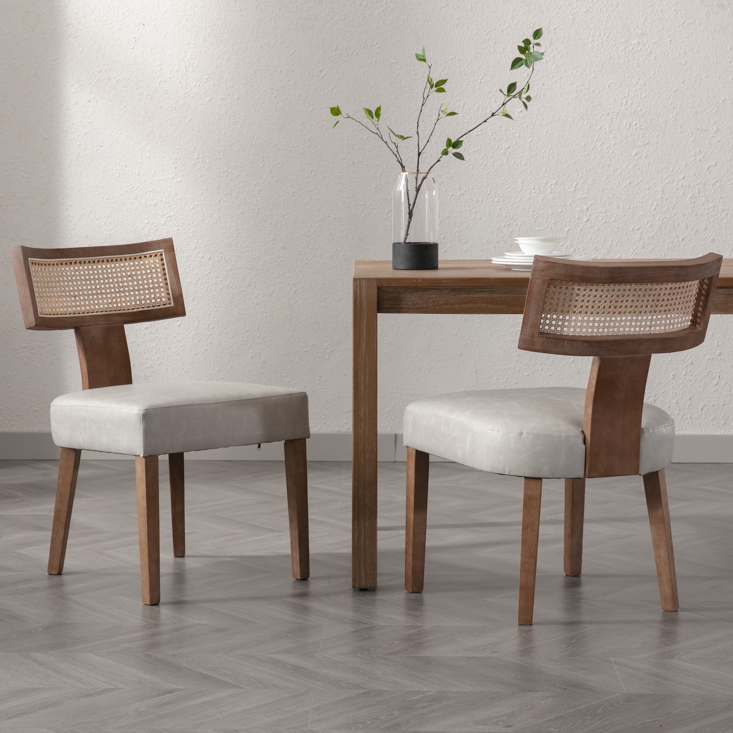 Two chairs with leather seats