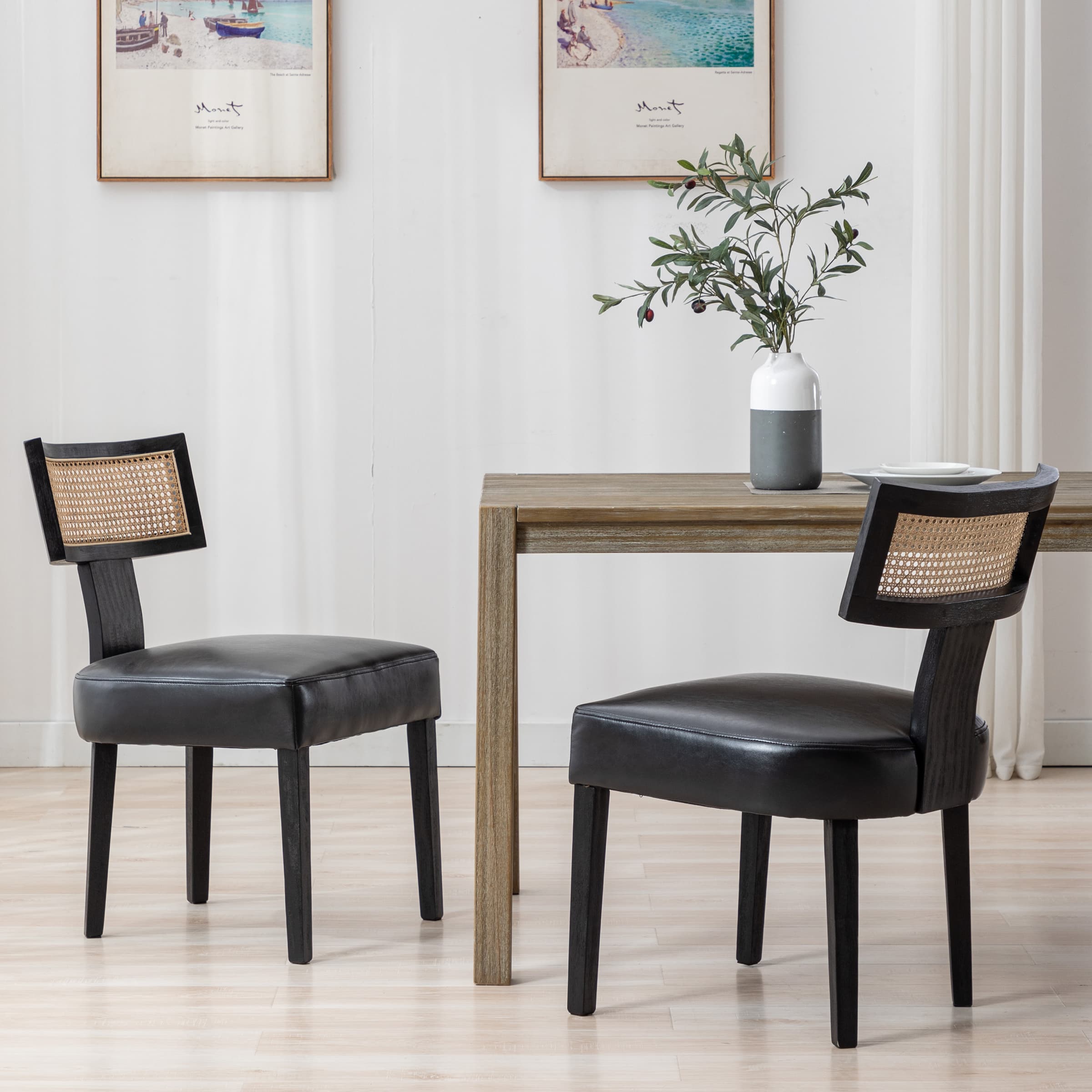 Chairs around table in white room