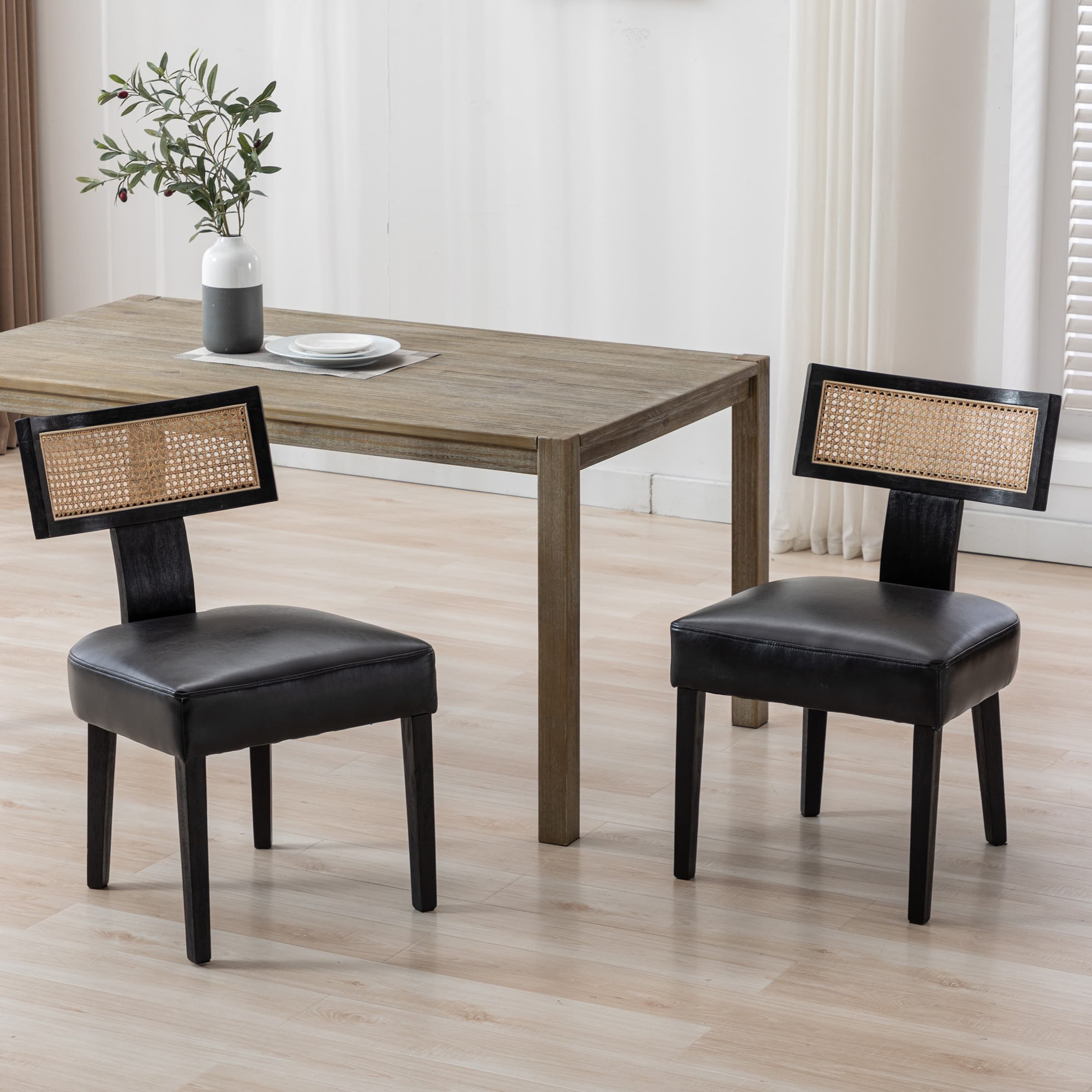 Chairs around table with two-tone upholstery
