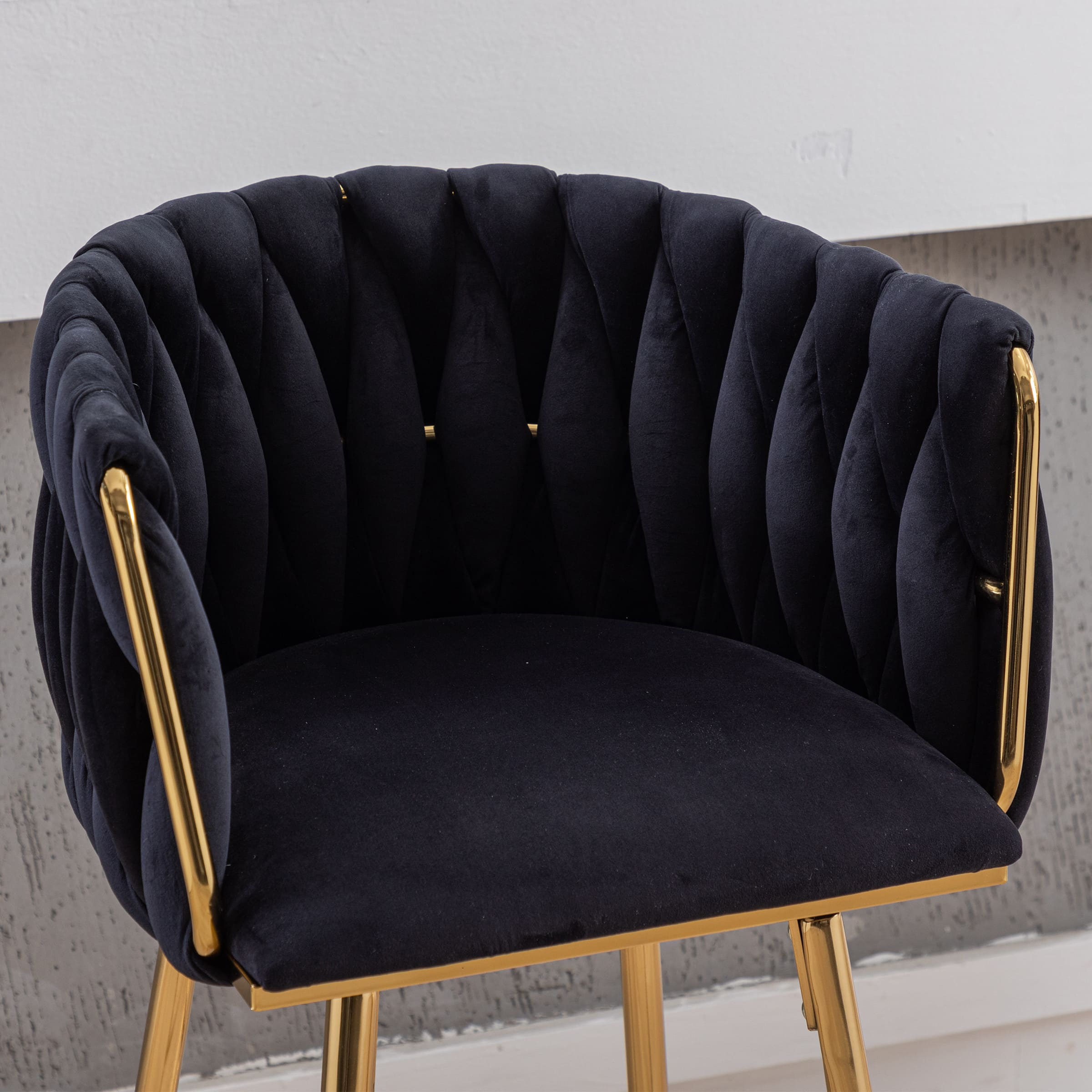 Close-up of navy upholstery and armrest