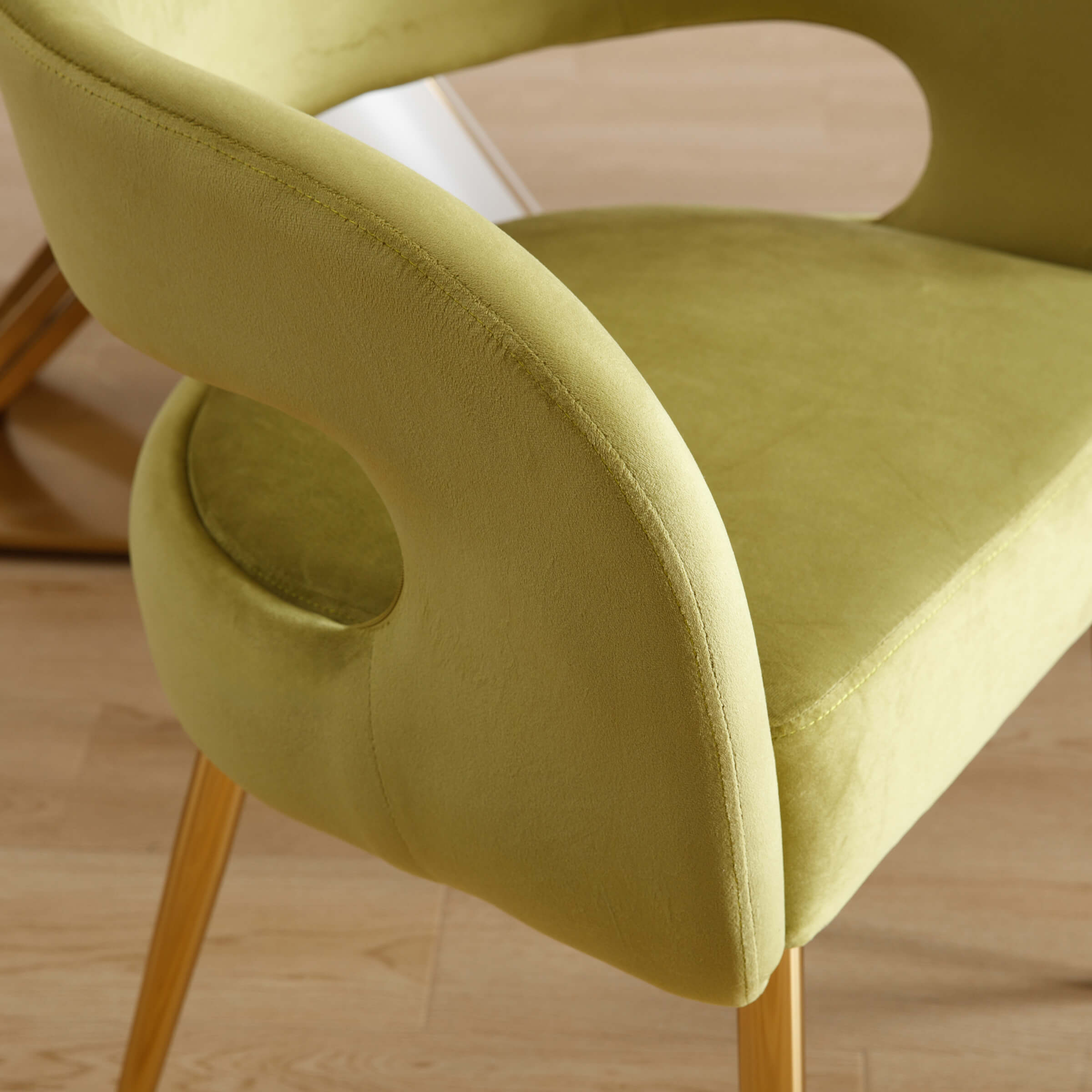 Close-up of chair arm/armrest curve