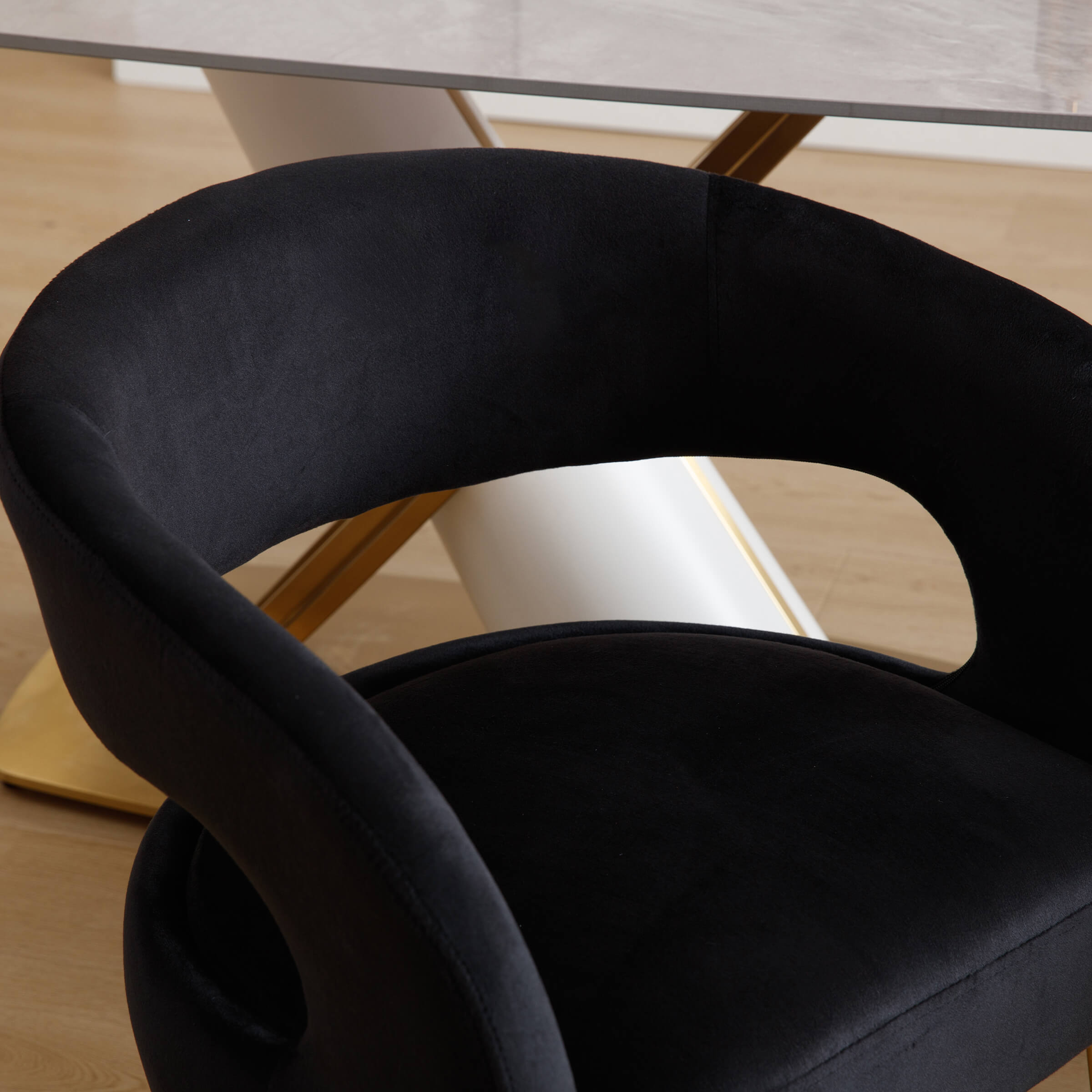 Close-up of chair armrest and velvet