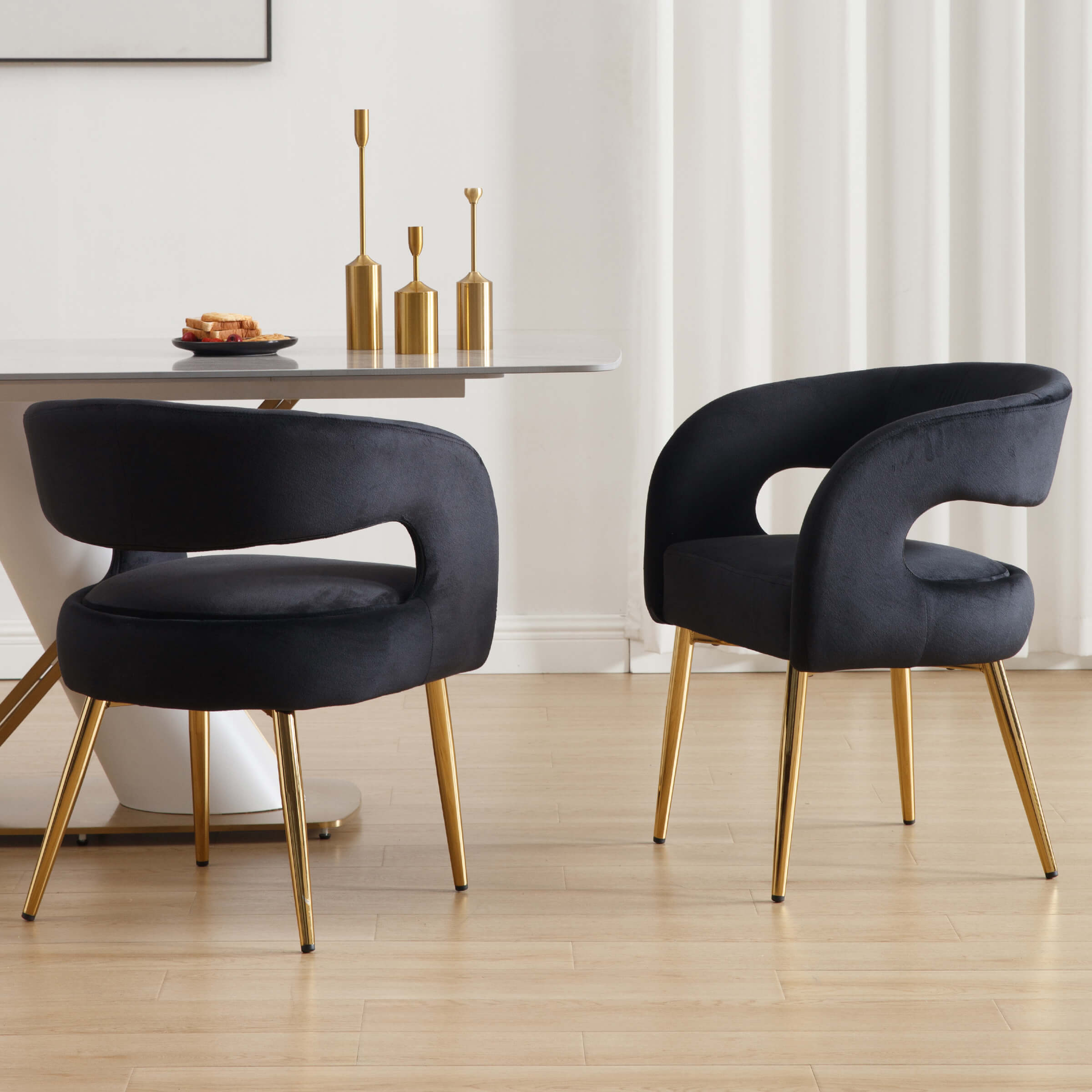 Black chairs around a table