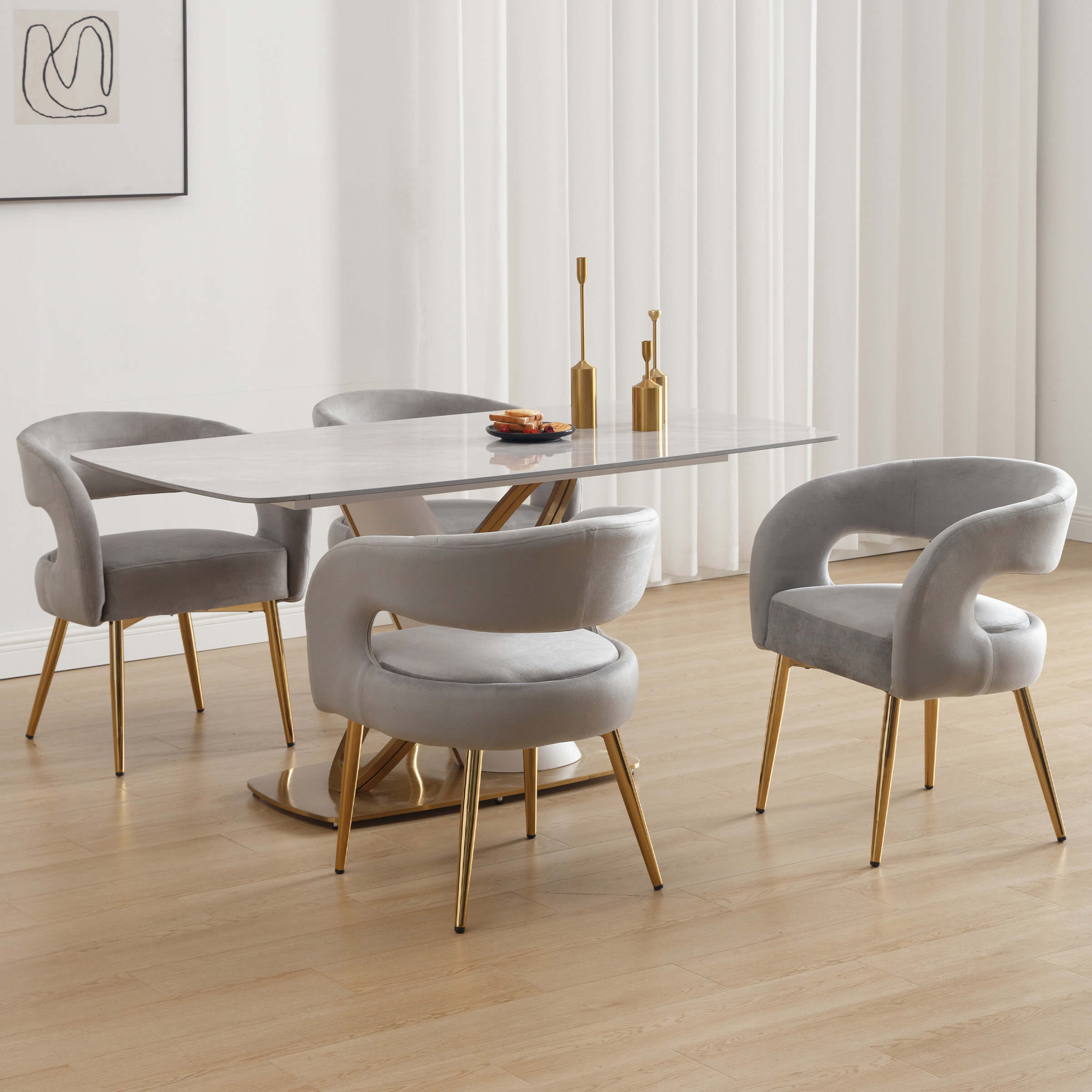 Table with four chairs in dining room