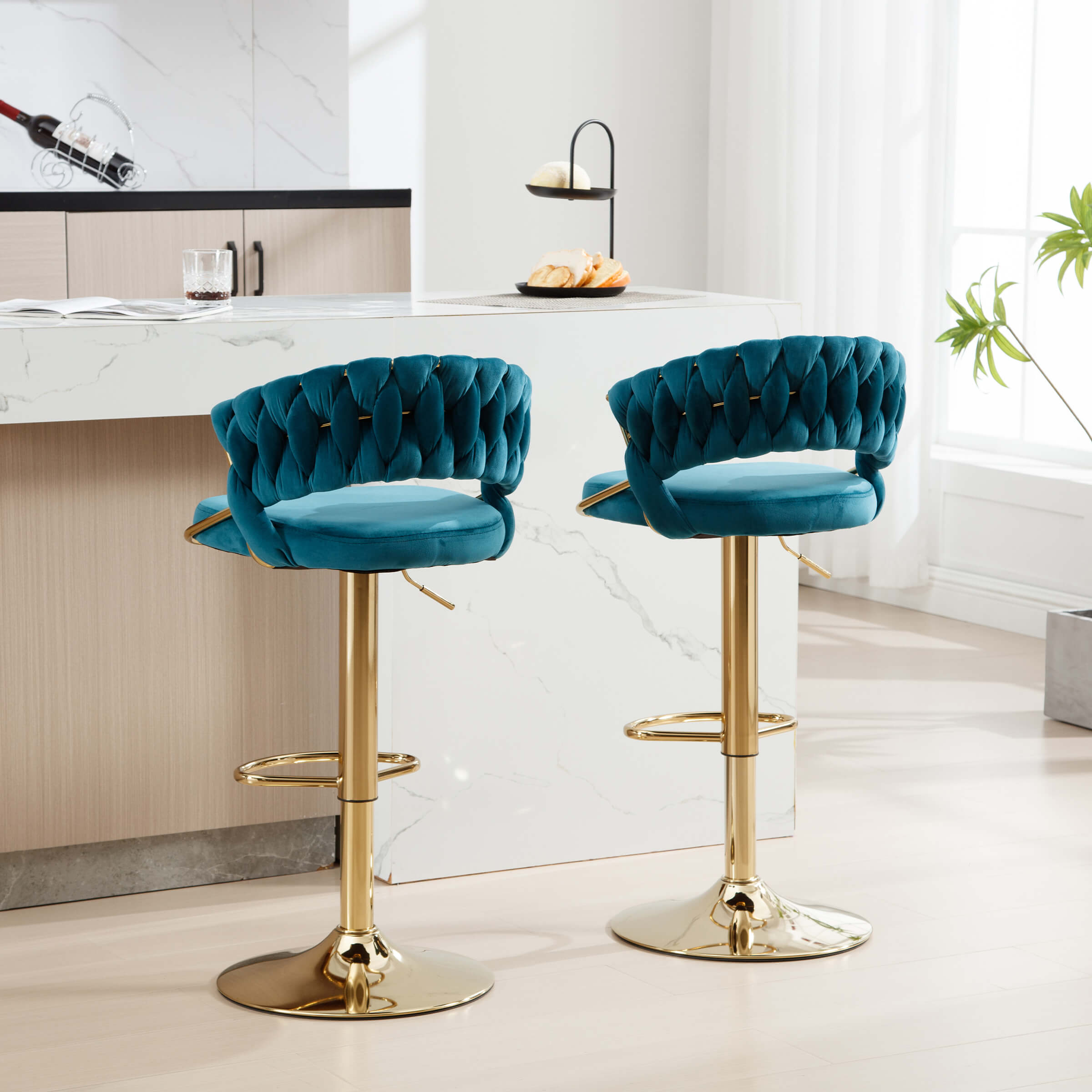 Stools in front of island with black light fixture