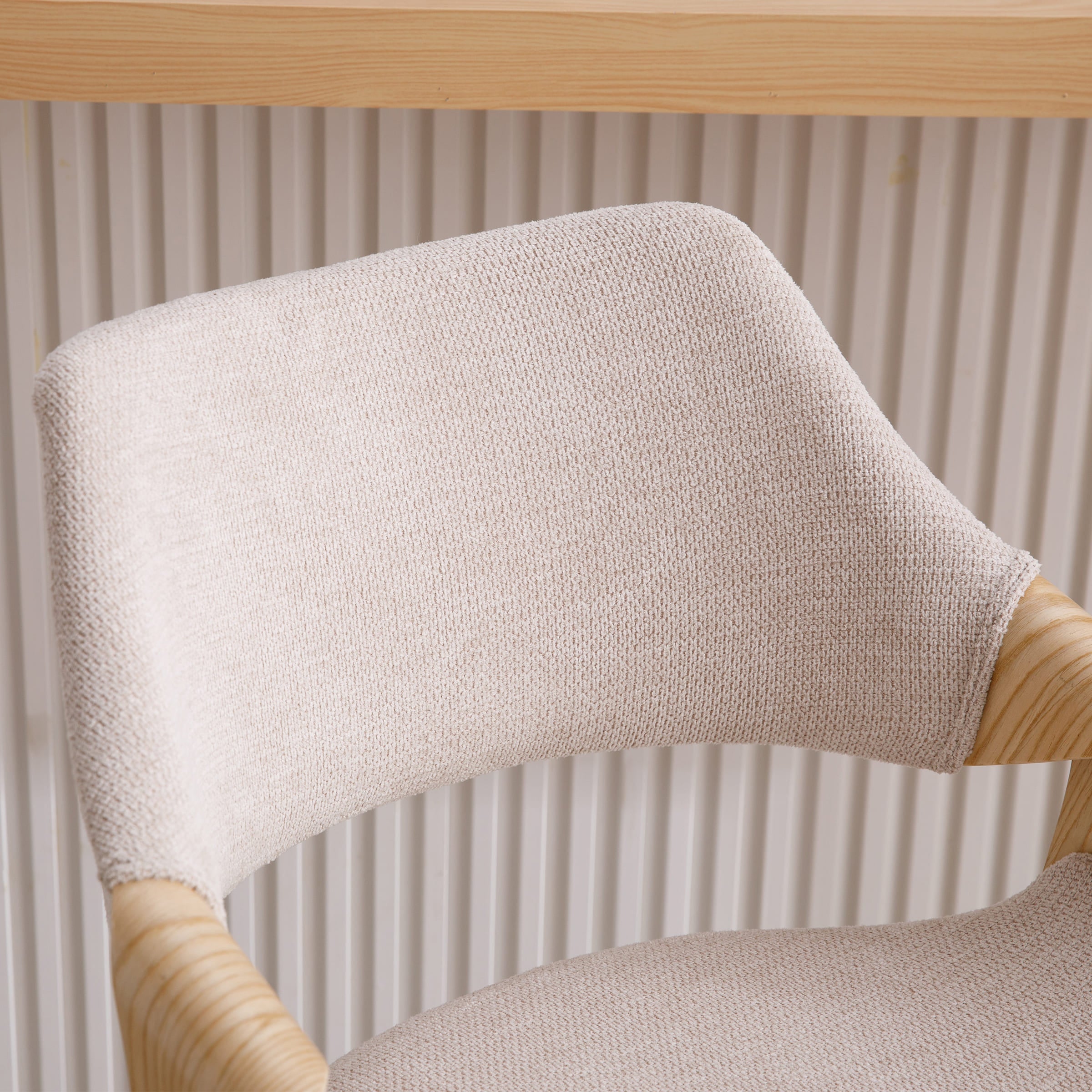 Close-up of beige fabric upholstery texture