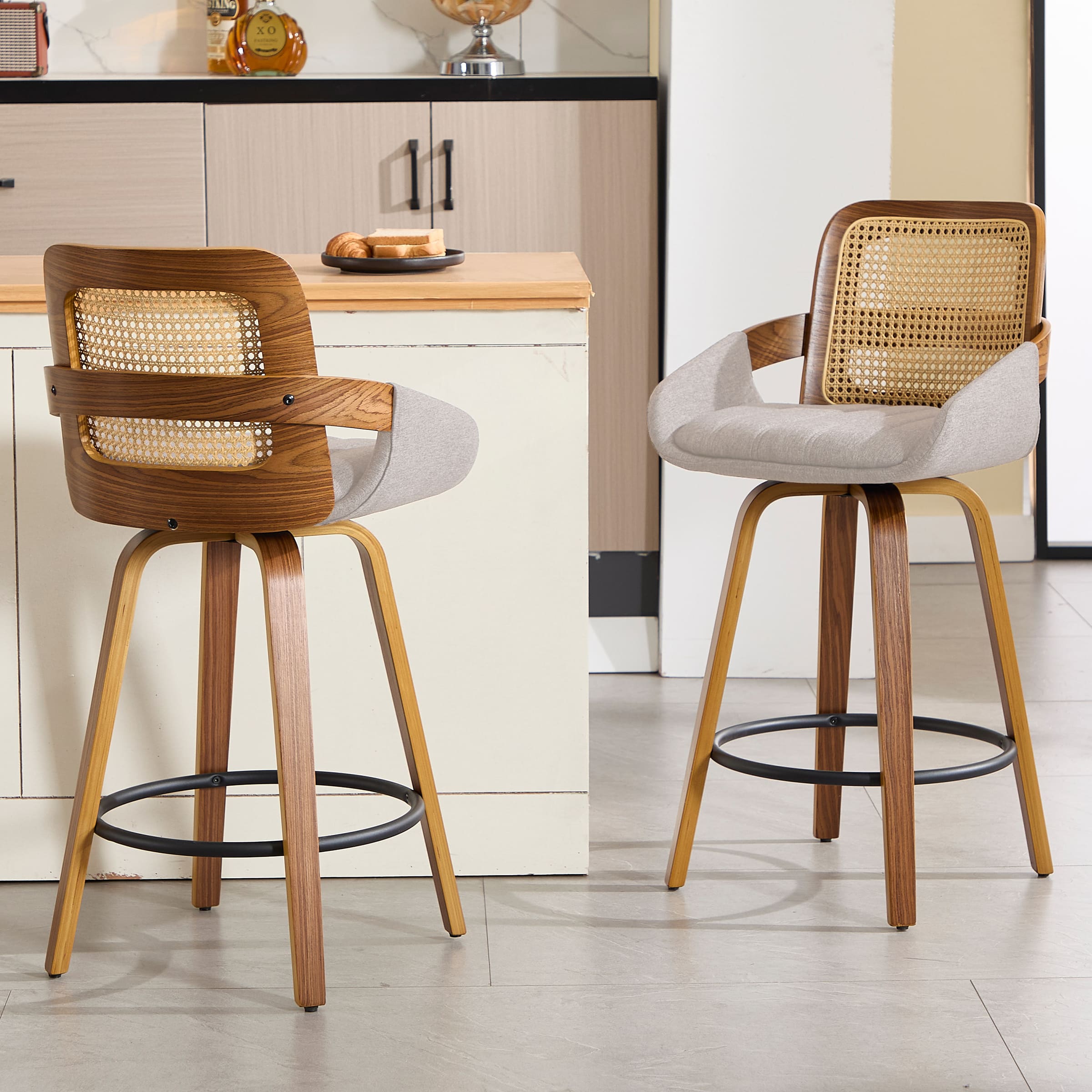 Two stools viewed from an angle with kitchen background