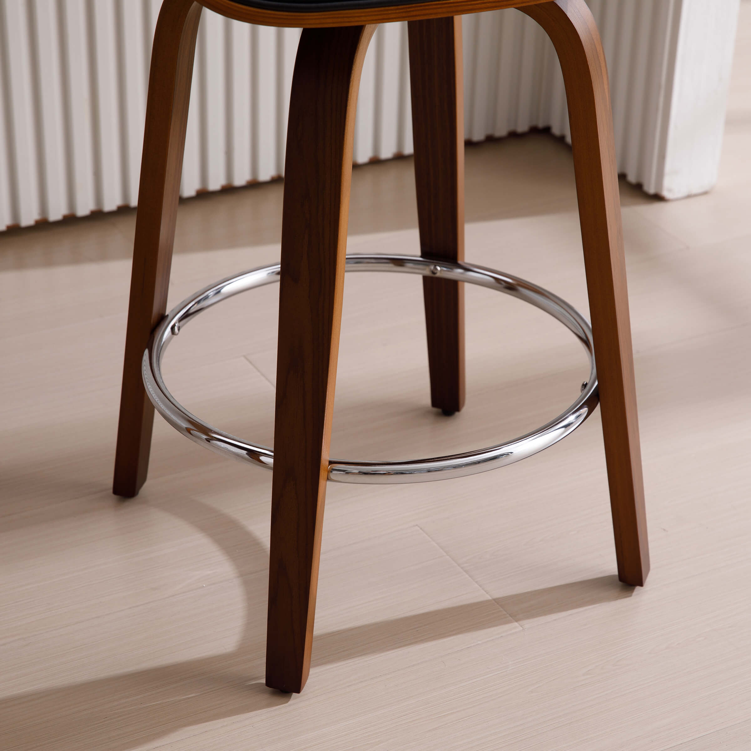 Bottom of stool legs and chrome footring