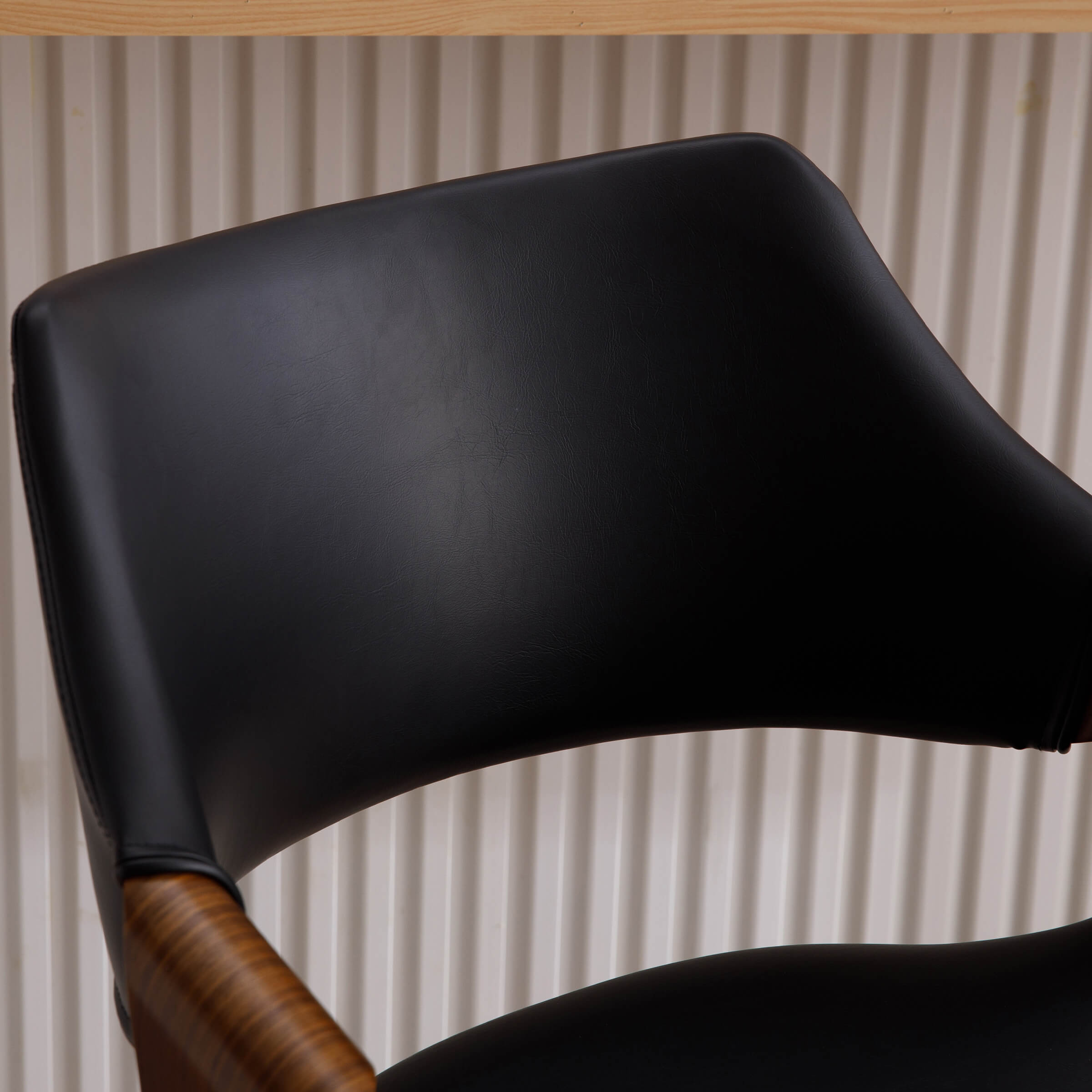 Close-up of backrest texture in black upholstery