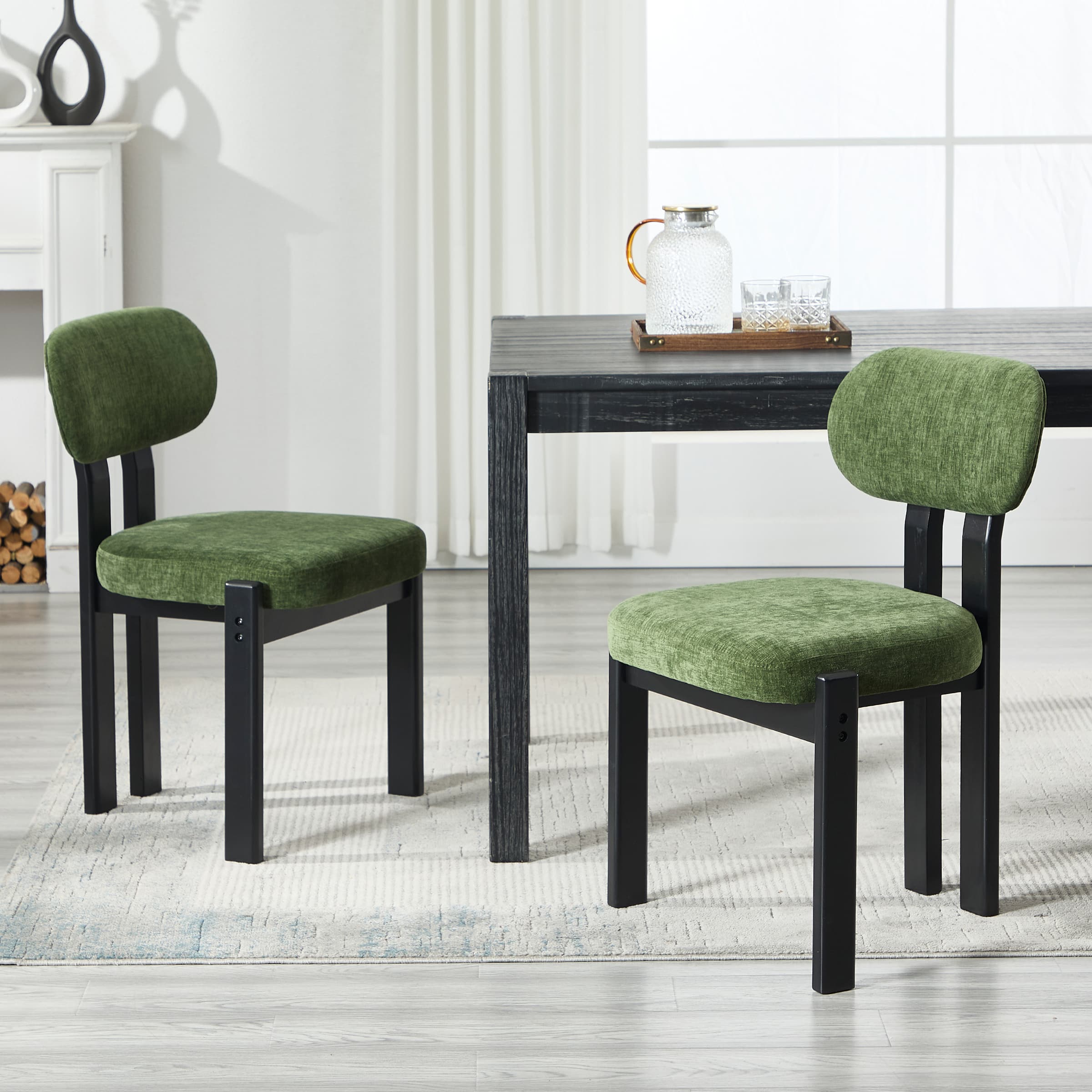 Green upholstered dining chairs around dark table