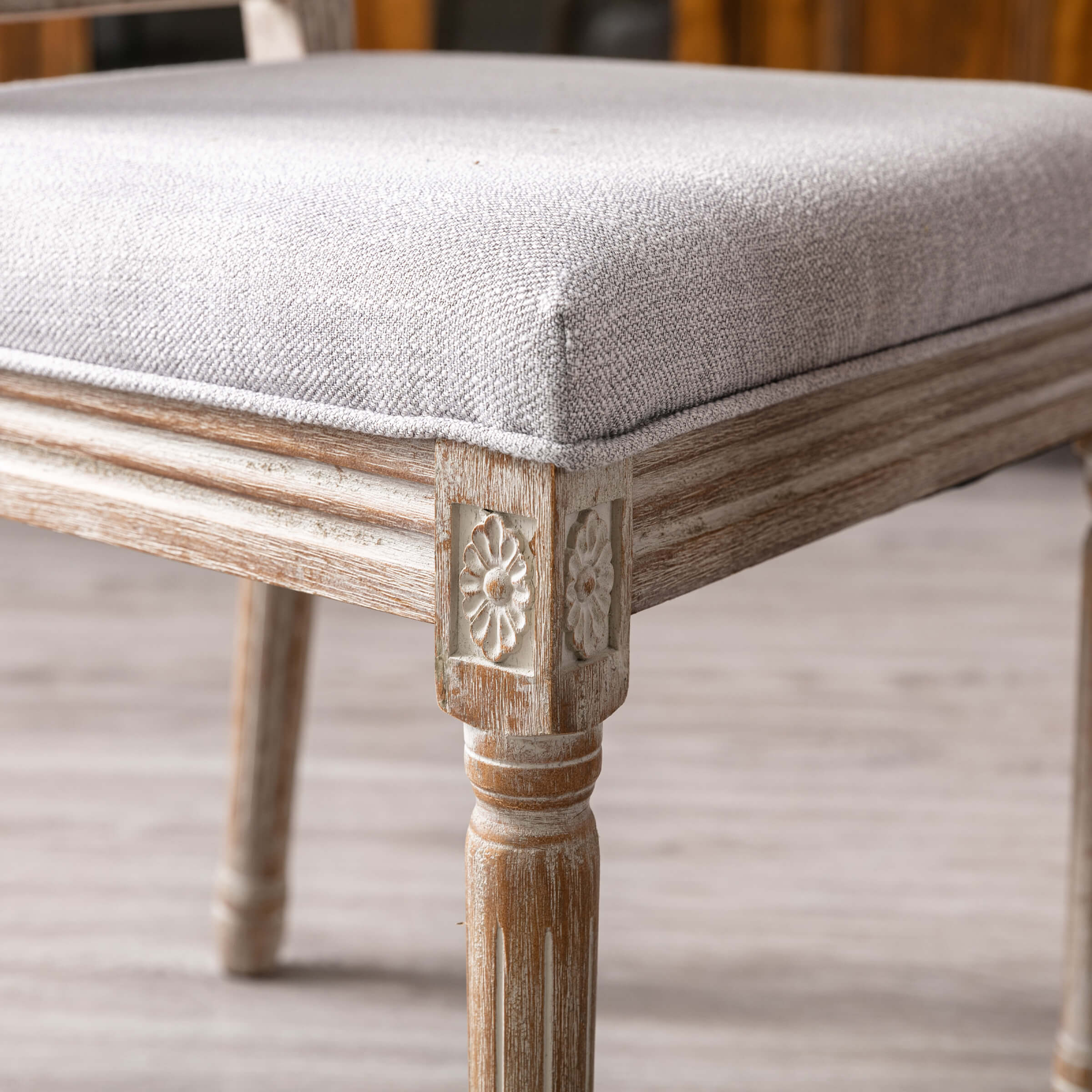 Corner floral carving on chair leg