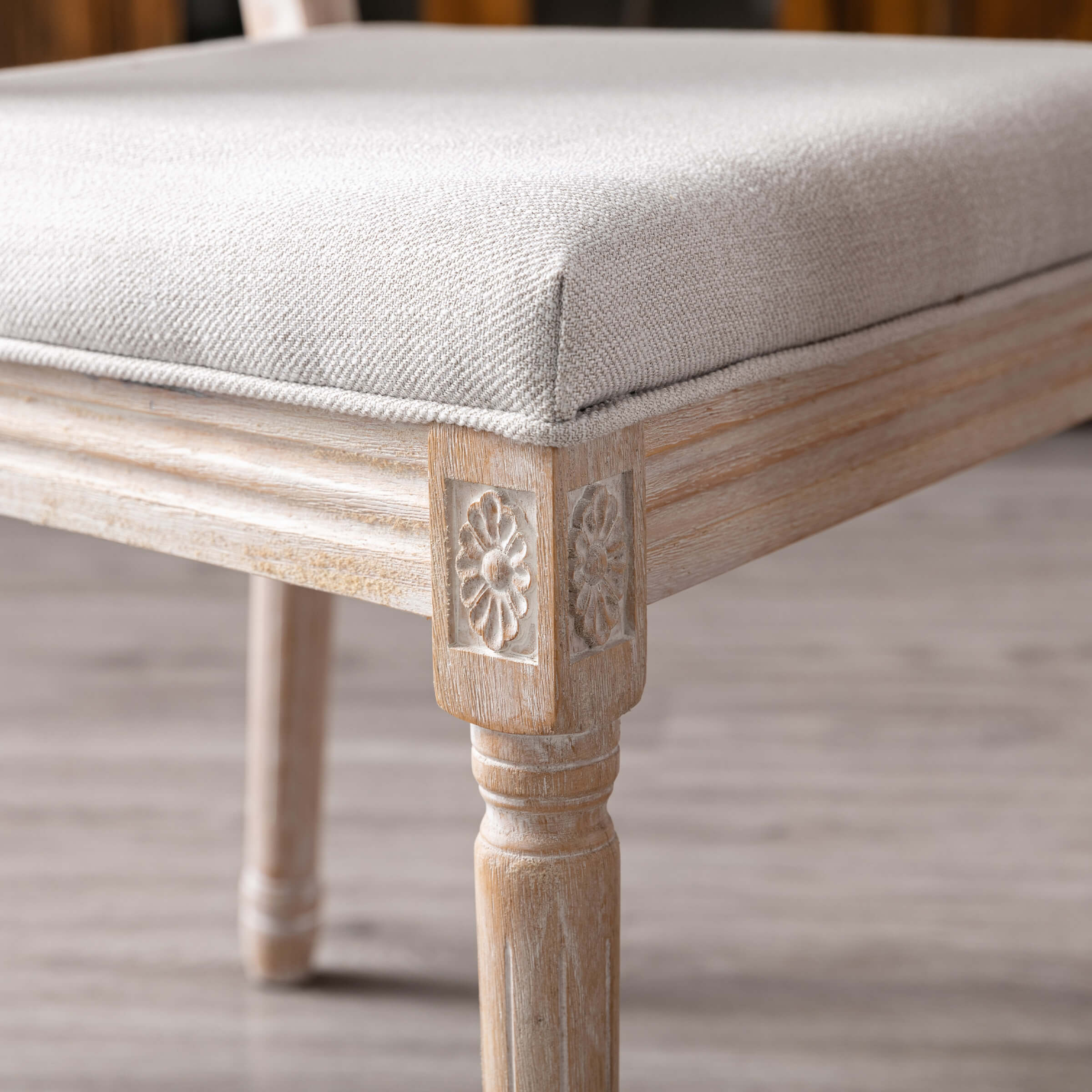 Corner floral carving on chair leg