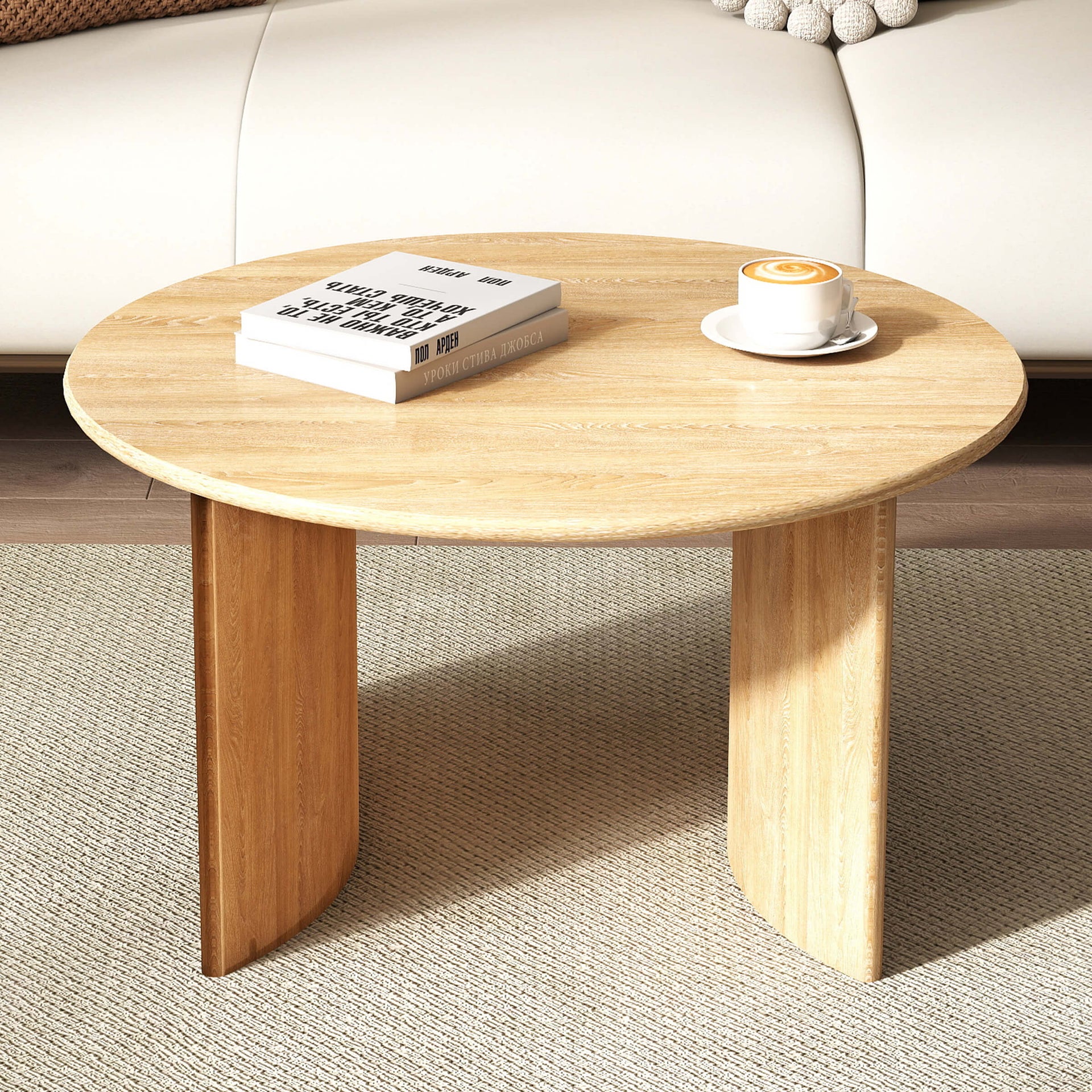 Light wood round table with two curved legs