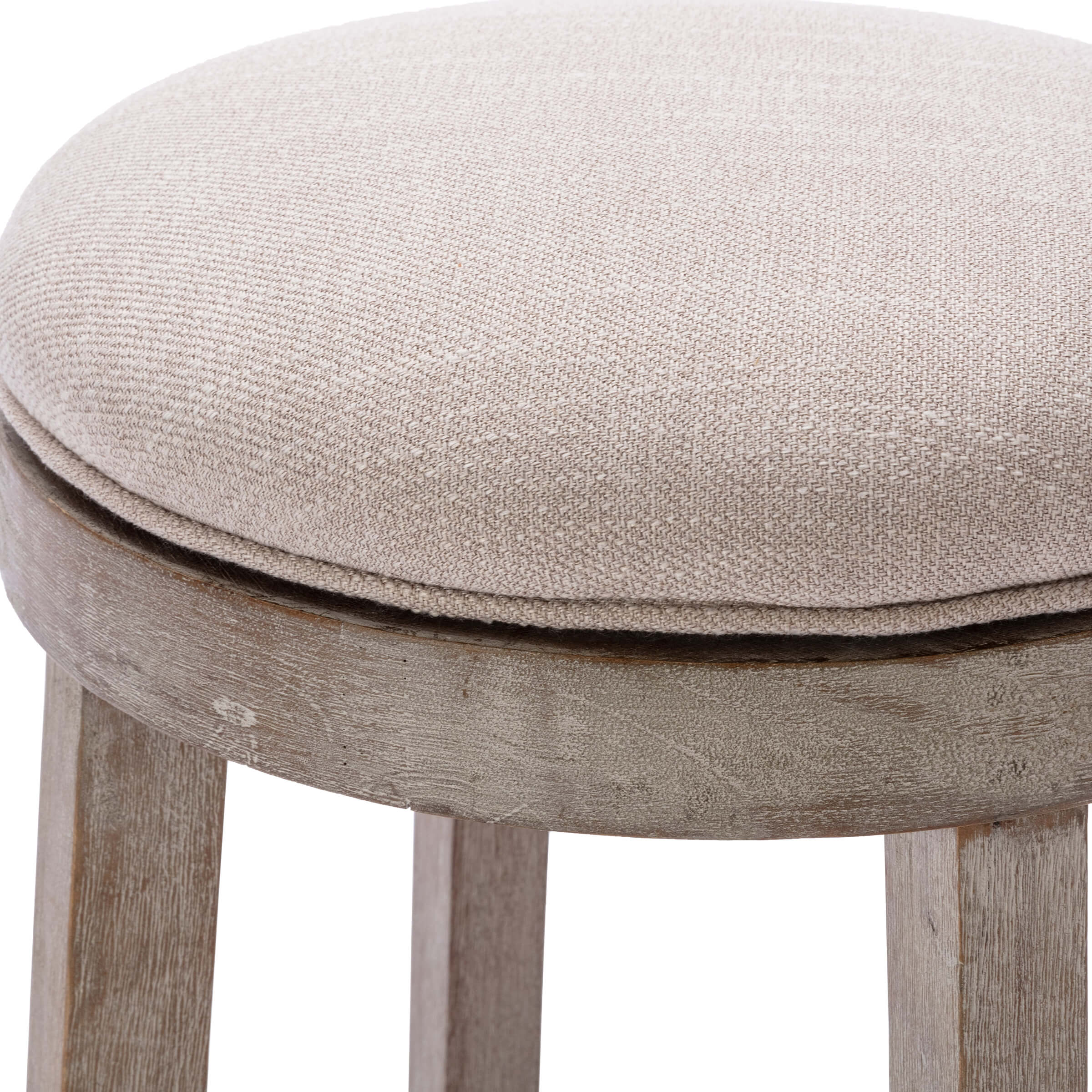 Close-up of beige upholstered round seat and wooden frame