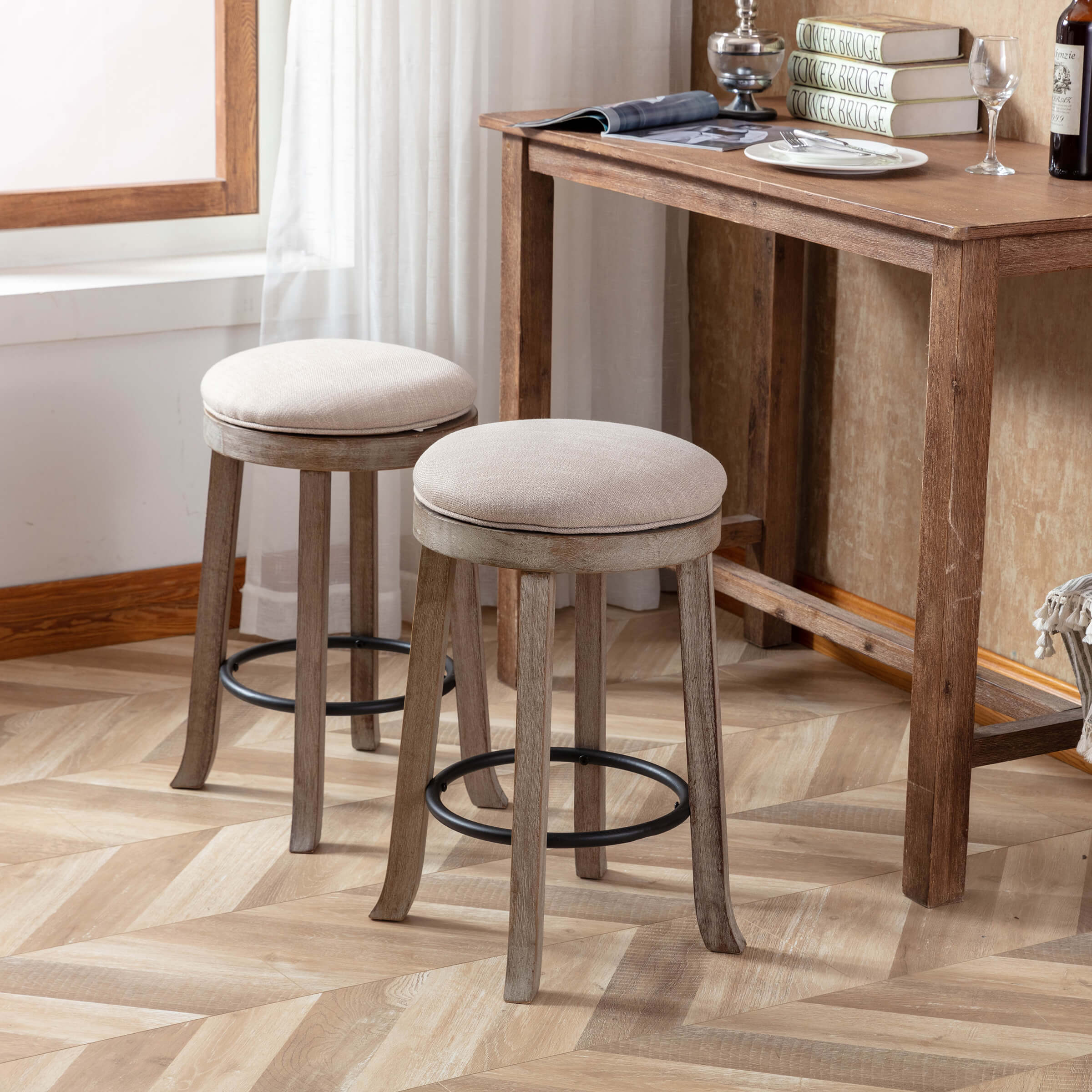 Two beige stools at a wooden bar/dining area