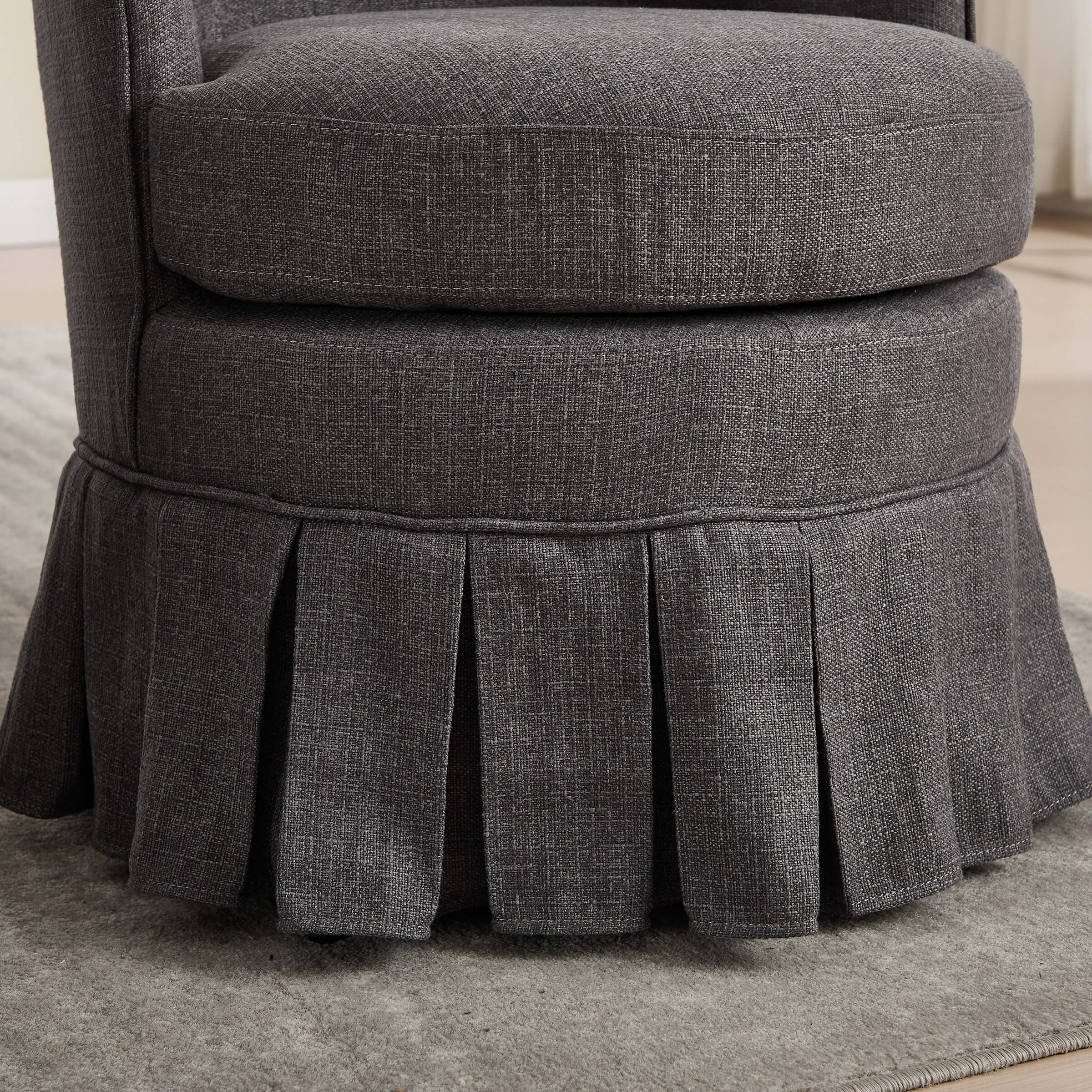 Side and front view of chair with pleated skirt