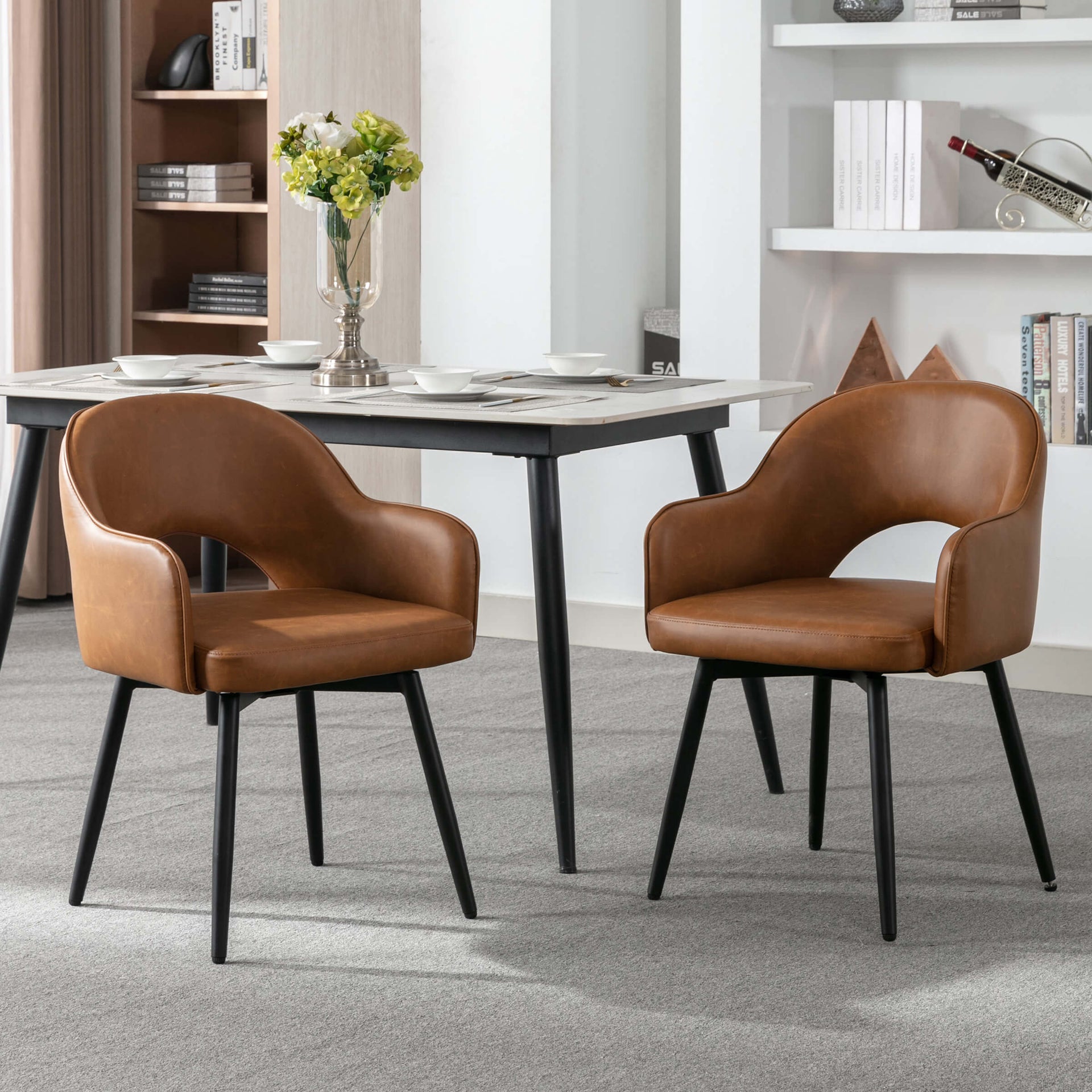 Two chairs with brown seats