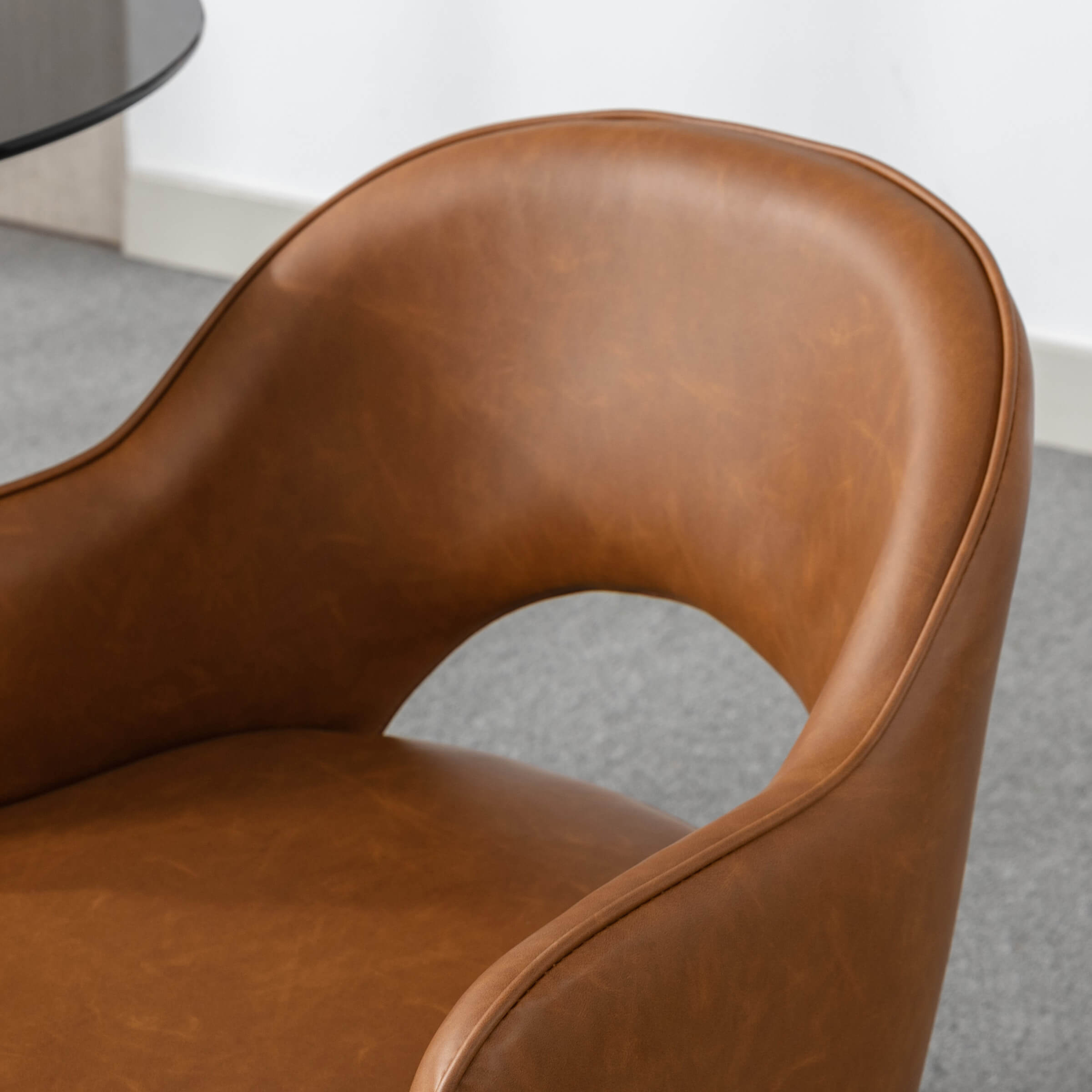 Leather seat close-up with stitching