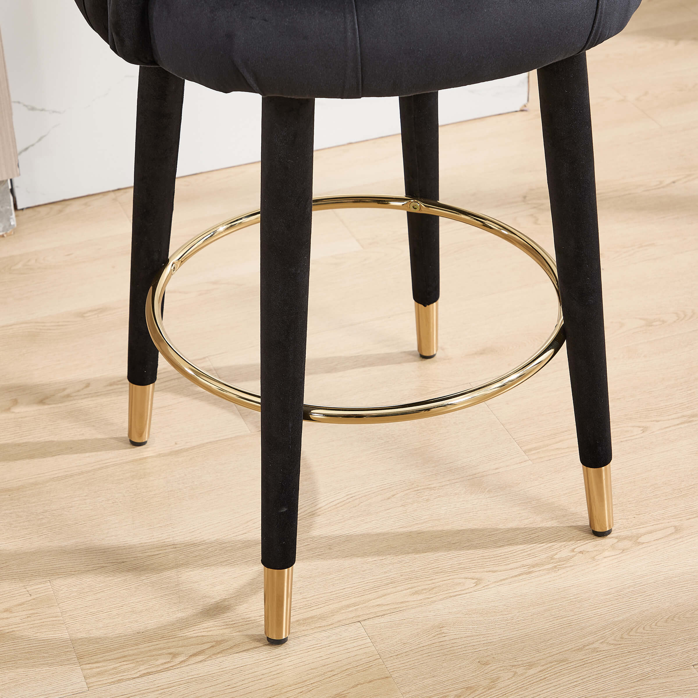 Close-up of chair legs and foot caps