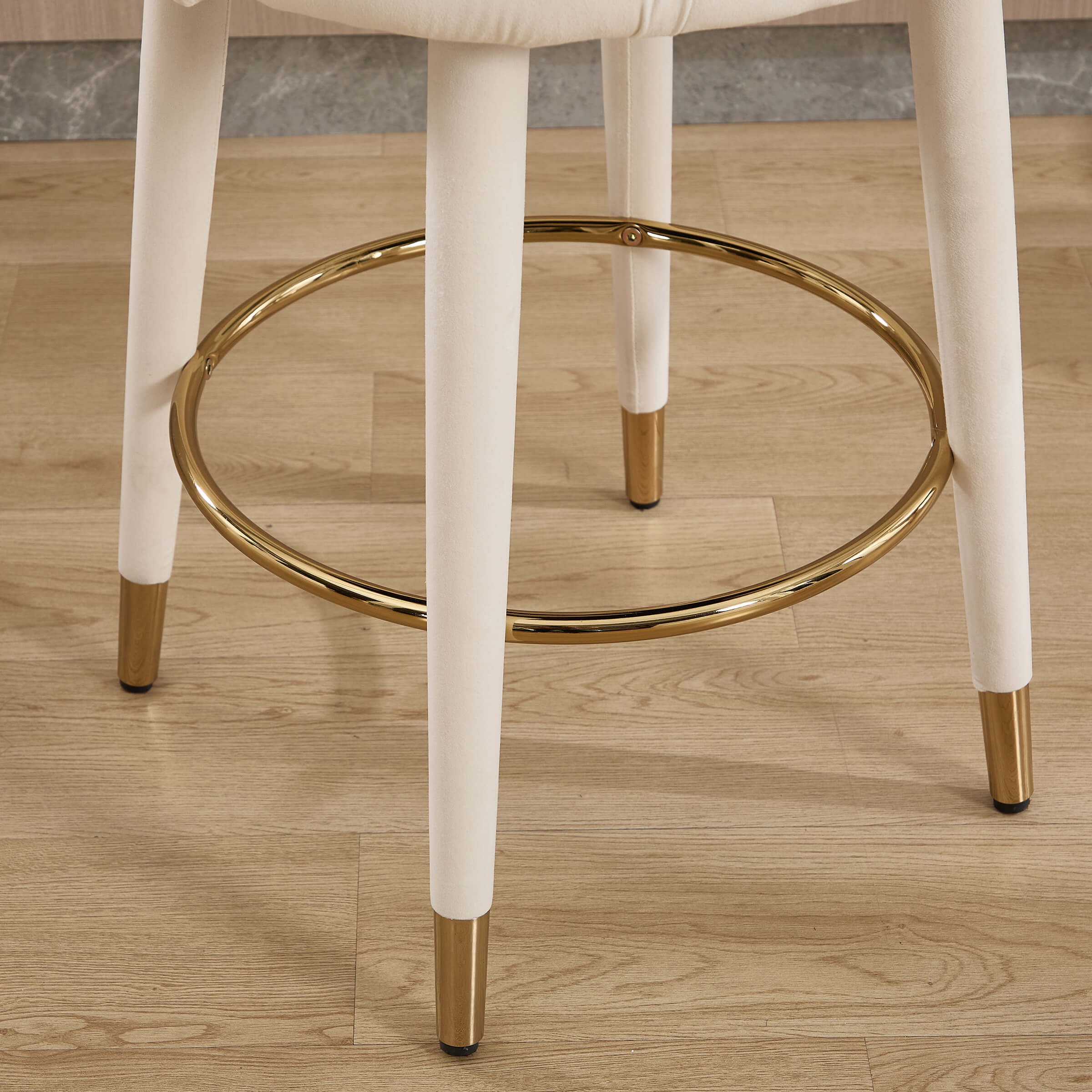Foot ring around stool legs