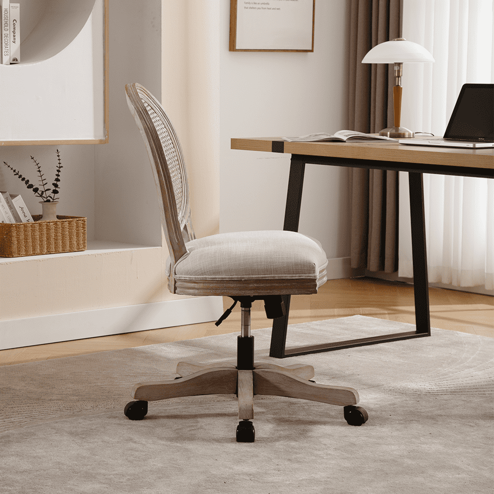 Side view of the same vintage swivel chair at desk